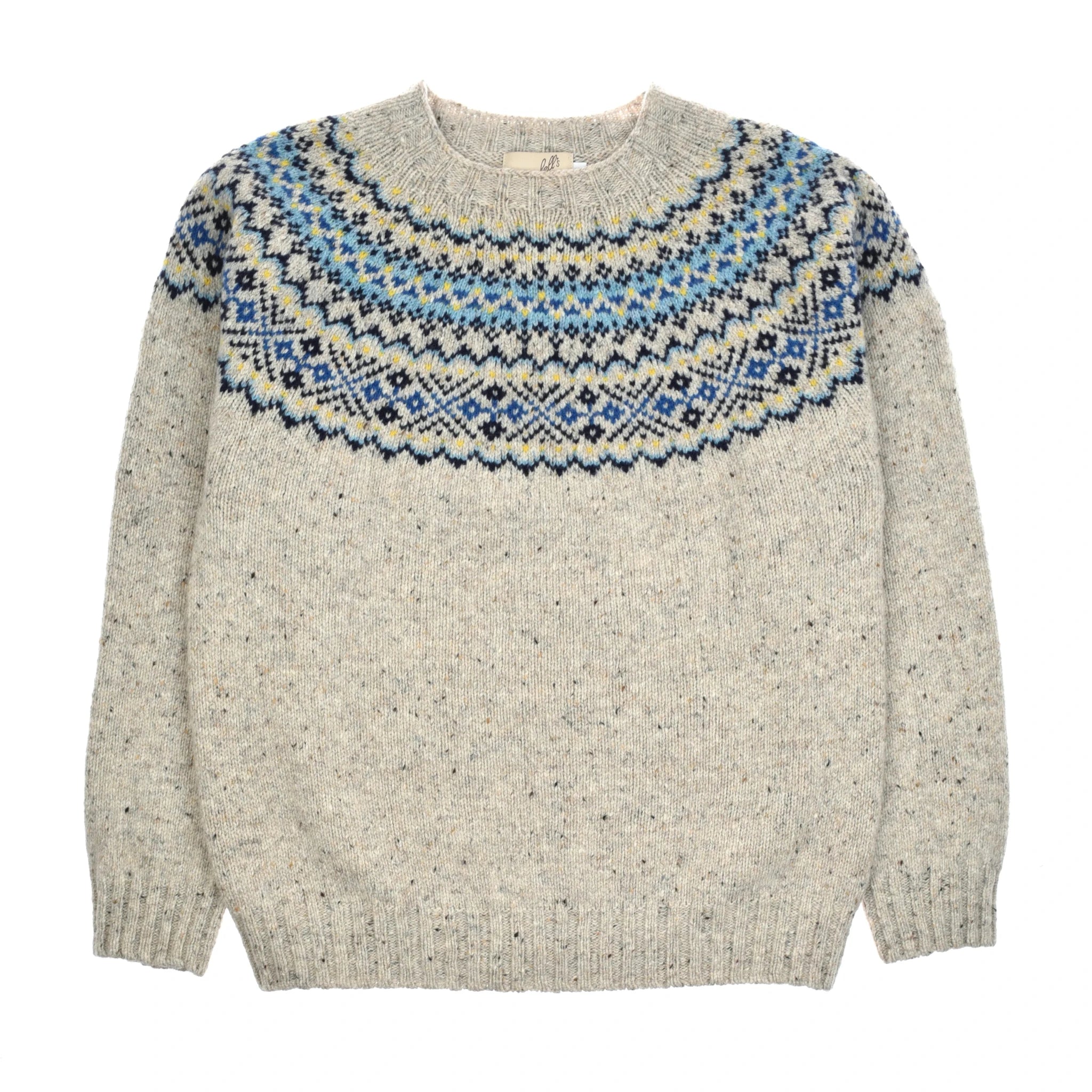 The Auld Stock Donegal Lambswool Fairisle Crew by Campbell’s of Beauly is a blue pure lambswool jumper featuring a circular Fairisle pattern with geometric designs around the neckline—an iconic take on the classic style.