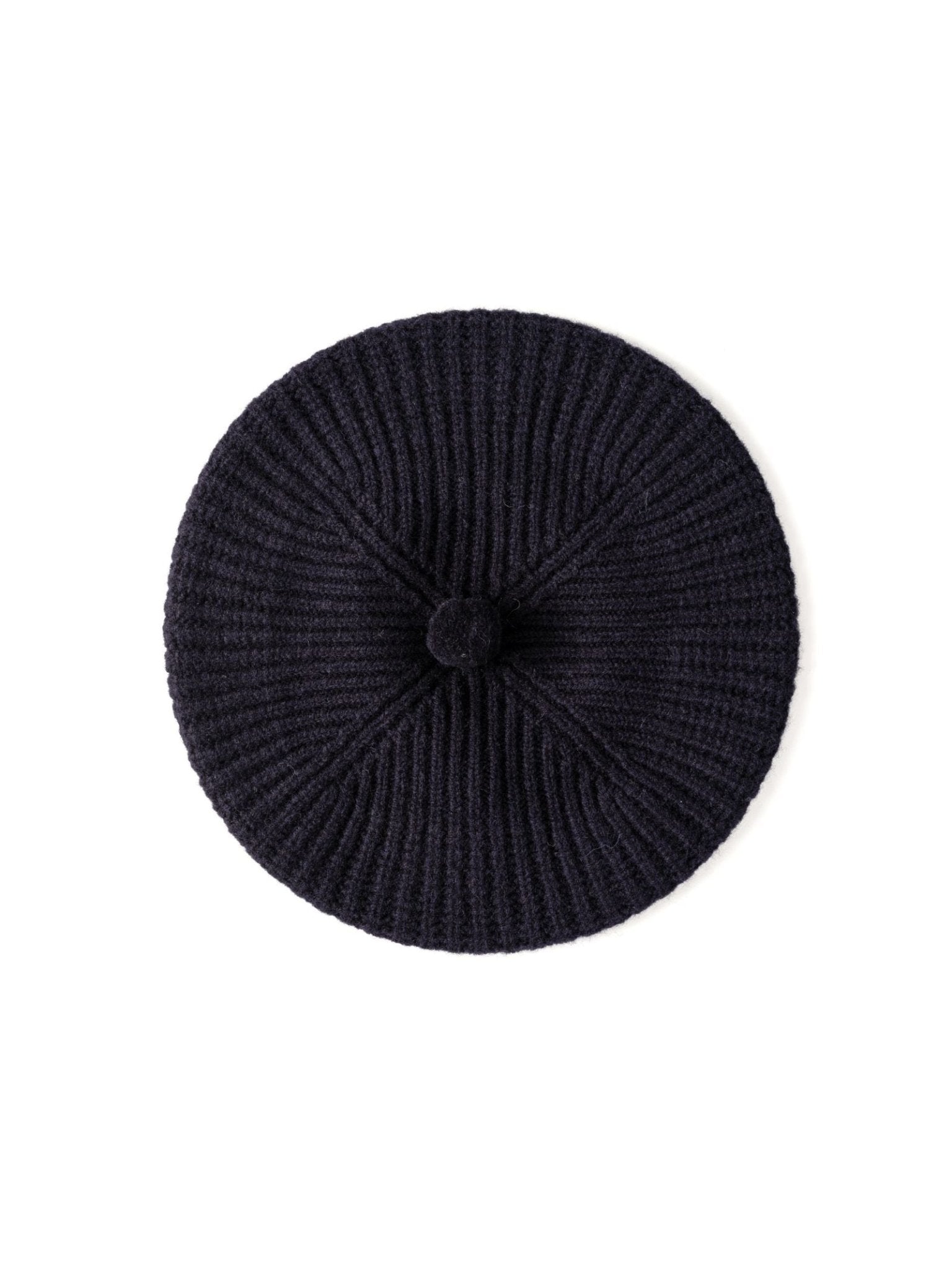 The Rib Beret by Campbell's of Beauly is a dark navy lambswool beret with ribbed detailing and a small pom-pom, shown from above against a white background—ideal for stylish winter wear.