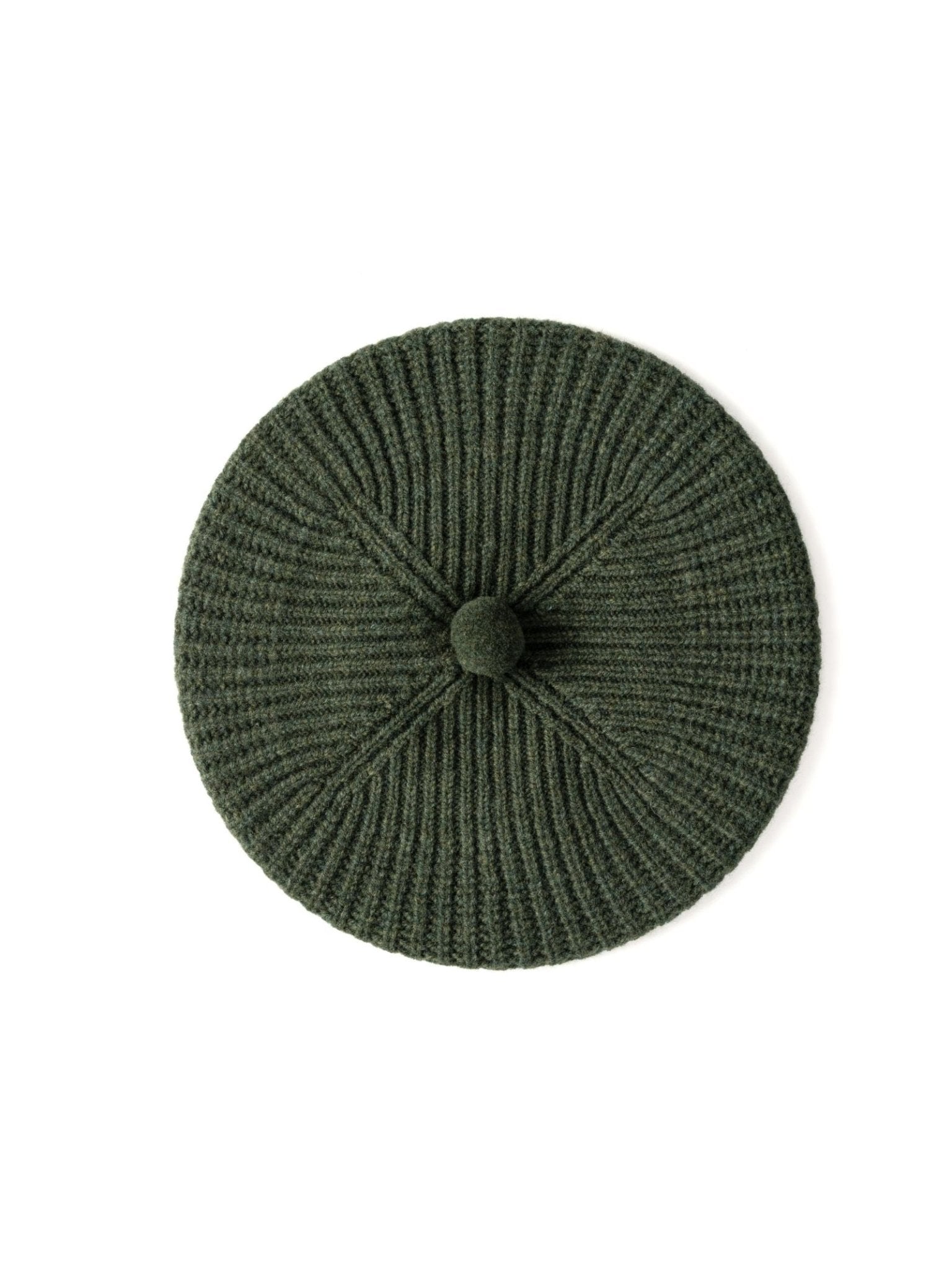 The Rib Beret by Campbell's of Beauly, in dark green lambswool with a central pompom, is shown from above on a white background—perfect for keeping warm and stylish in winter.