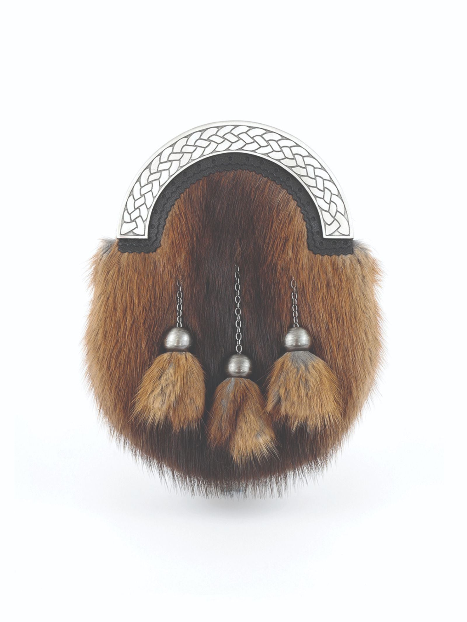 The Brown Musquash Sporran by Campbell's of Beauly features a decorative metal cantle, three hanging fur tassels, and a silver and black flap with an intricate Celtic knot pattern—perfect for traditional Highland dress.
