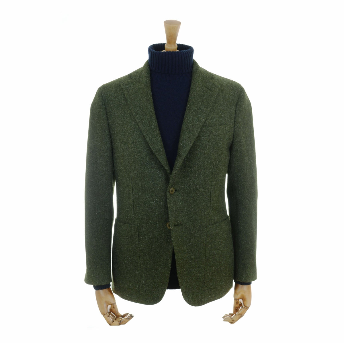 A mannequin wears a Campbell's of Beauly Harris Tweed Jacket in dark green over a dark navy turtleneck, set against a white background.
