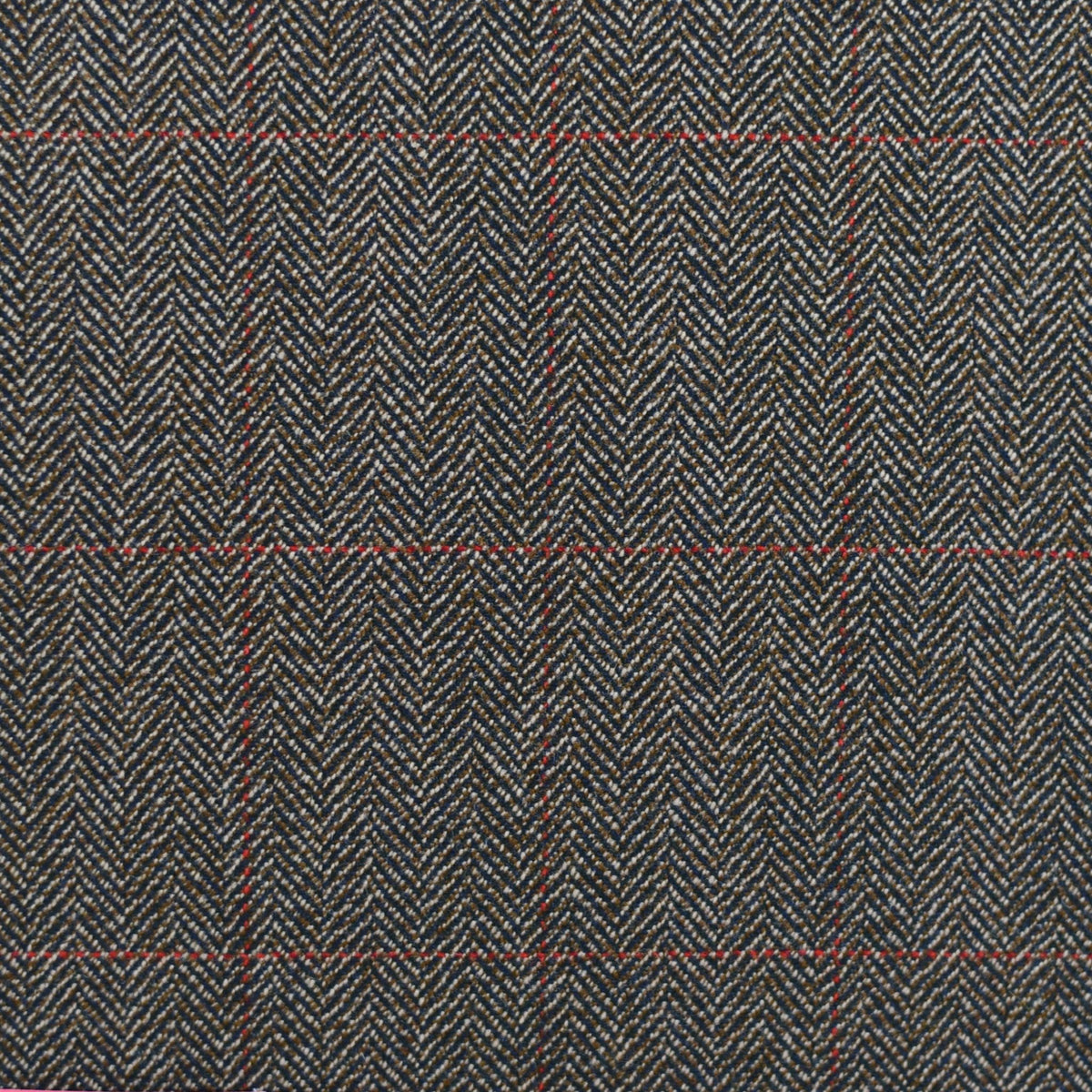 House Tweed 68866 by Campbell's of Beauly is a herringbone tweed fabric in black, white, and grey with thin red and blue lines forming a subtle windowpane check.