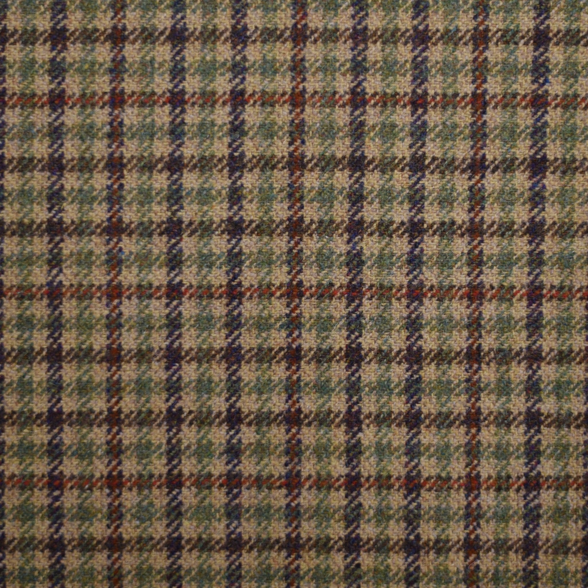A close-up of House Tweed 84934 by Campbells of Beauly reveals a soft, slightly fuzzy wool fabric in a tartan plaid pattern, echoing the traditional Scottish styles from the Borders.