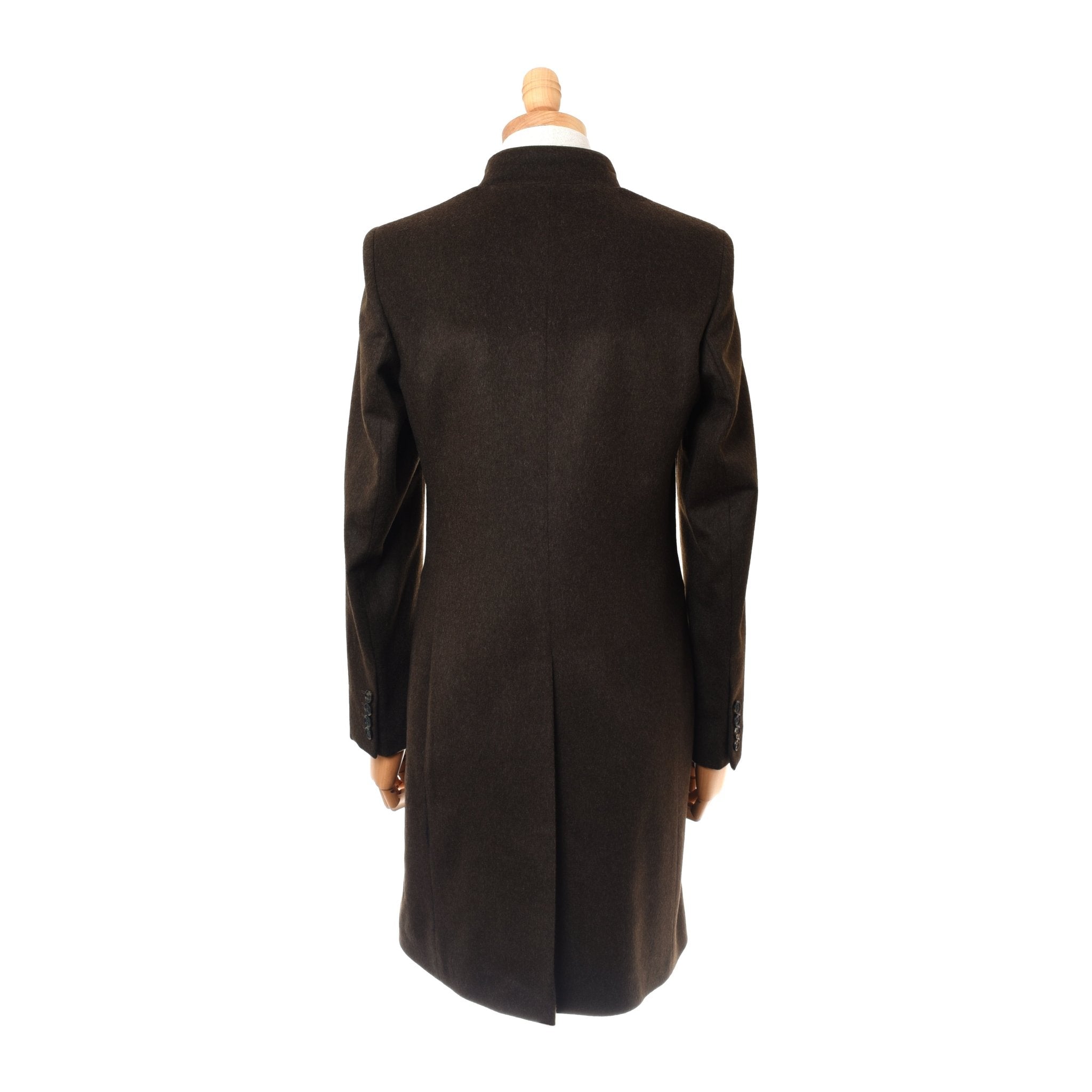 The Loden Green Millie Coat by Campbells of Beauly is shown from the back on a mannequin against a white background, featuring Austrian loden wool, long sleeves, straight cut, back vent, and subtle Nehru-style details.