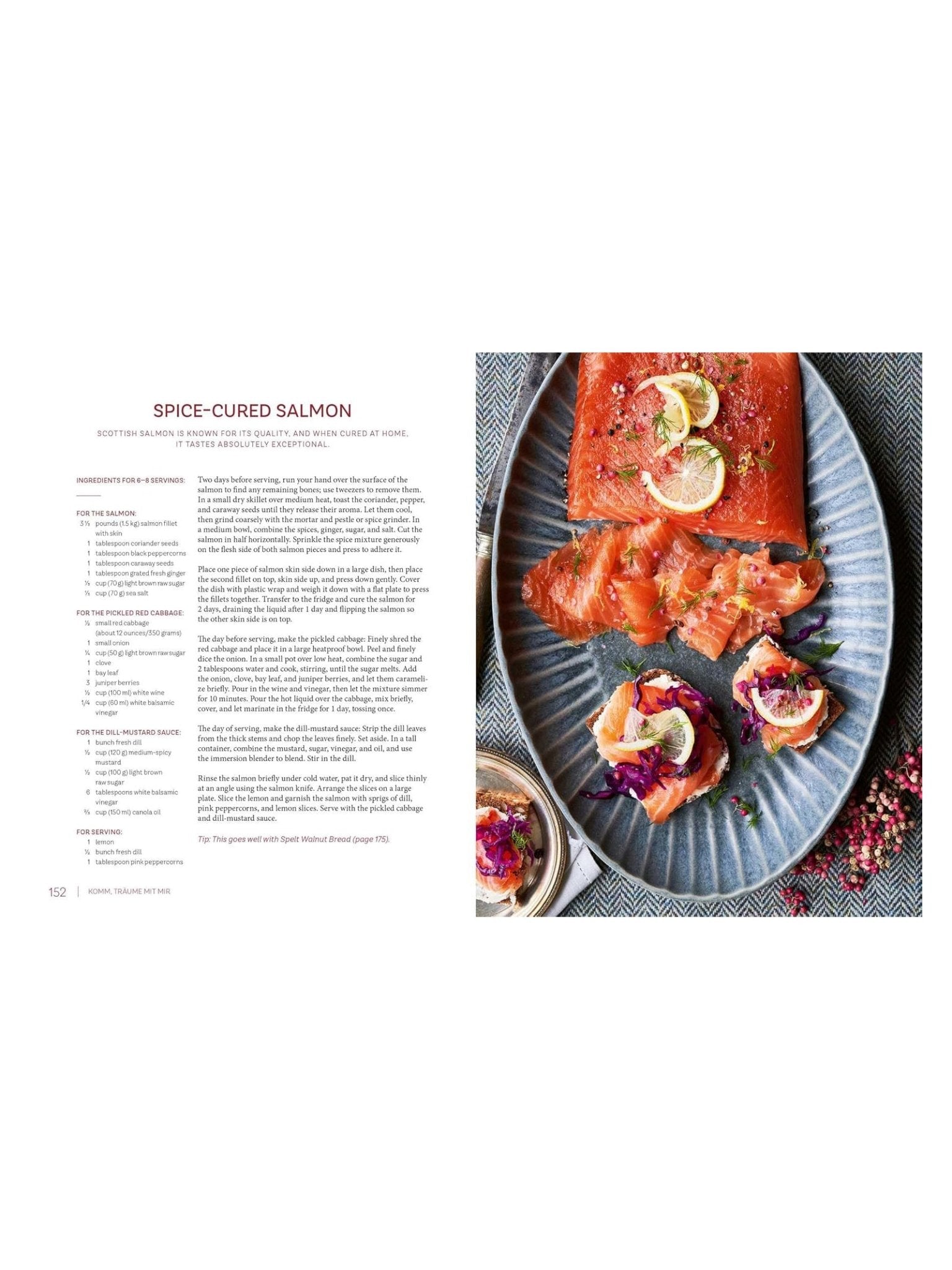 An open Highland Harvest Book from Campbell's of Beauly shows a spice-cured salmon recipe, while a plate on the right presents cured salmon slabs, slices with lemon, and salmon-topped bread—ideal for lovers of Scottish recipes.