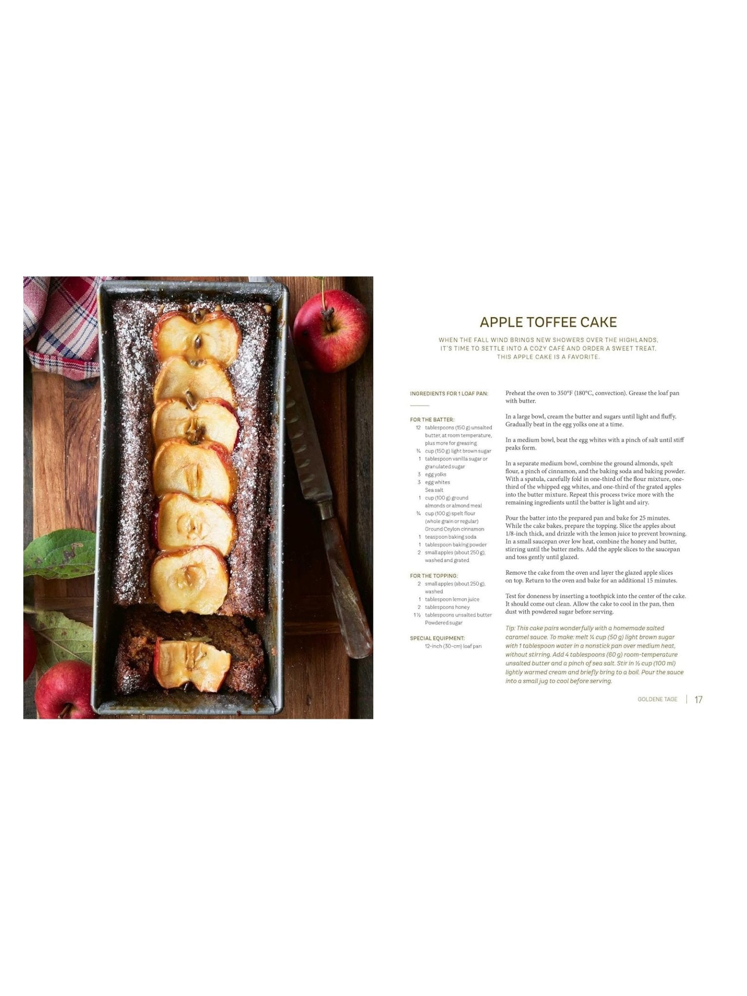 A rectangular apple toffee cake in a loaf pan sits on a wooden table with apples and a knife, evoking cozy Scottish flavors inspired by the Highland Harvest Book from Campbell's of Beauly.
