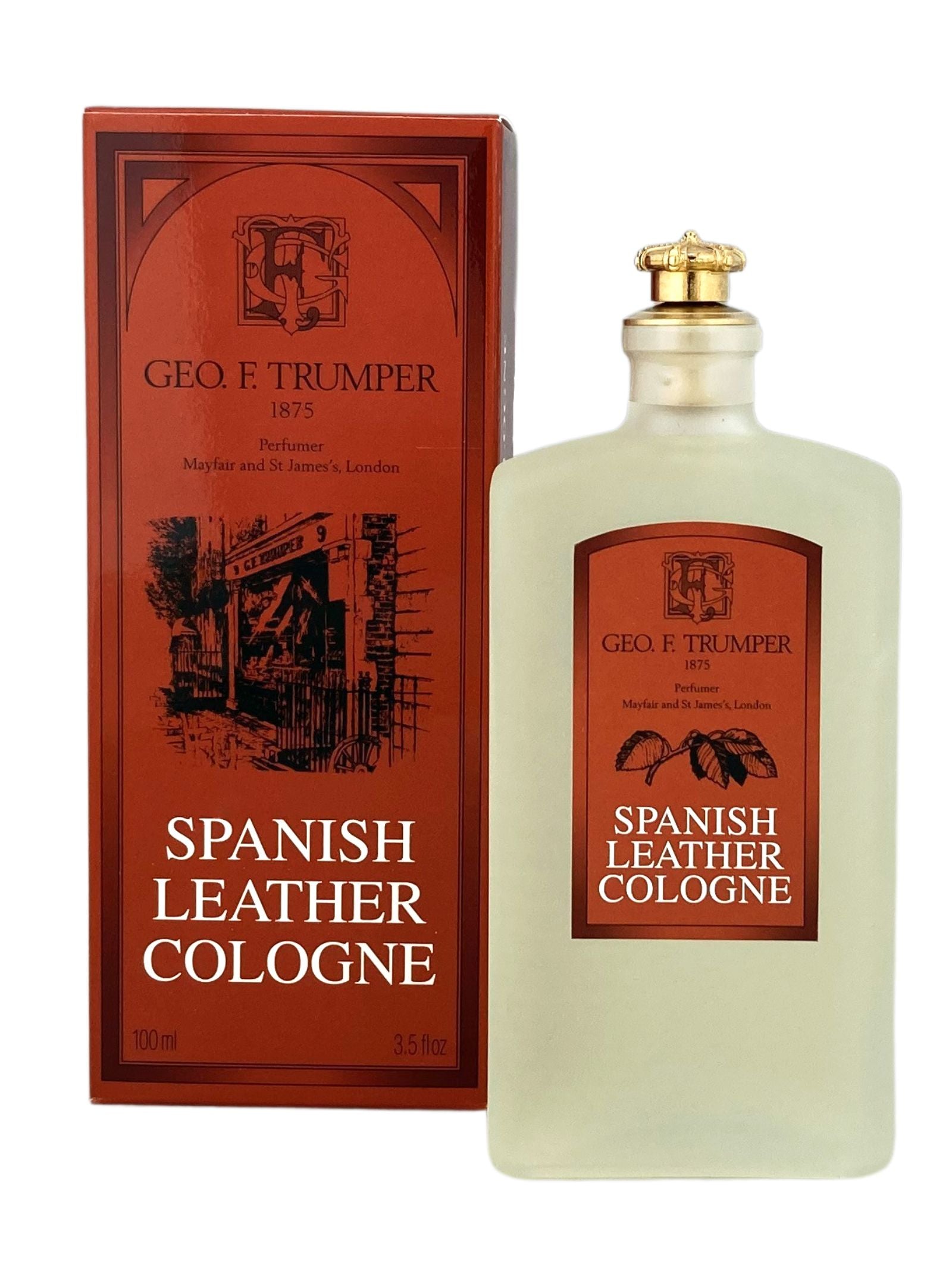A bottle of Geo. F. Trumper Spanish Leather Cologne is placed beside its box, both displaying vintage-style red and gold labels with decorative accents, reflecting the classic character of this fragrance.