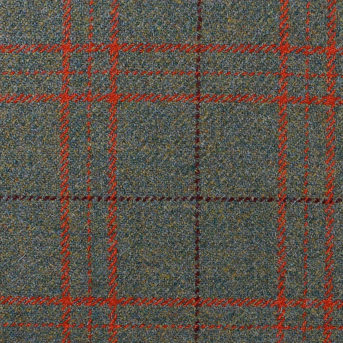 Estate Tweed 014 heavyweight wool in a grey and green speckled tweed with a bold orange and dark red estate tweed plaid pattern.