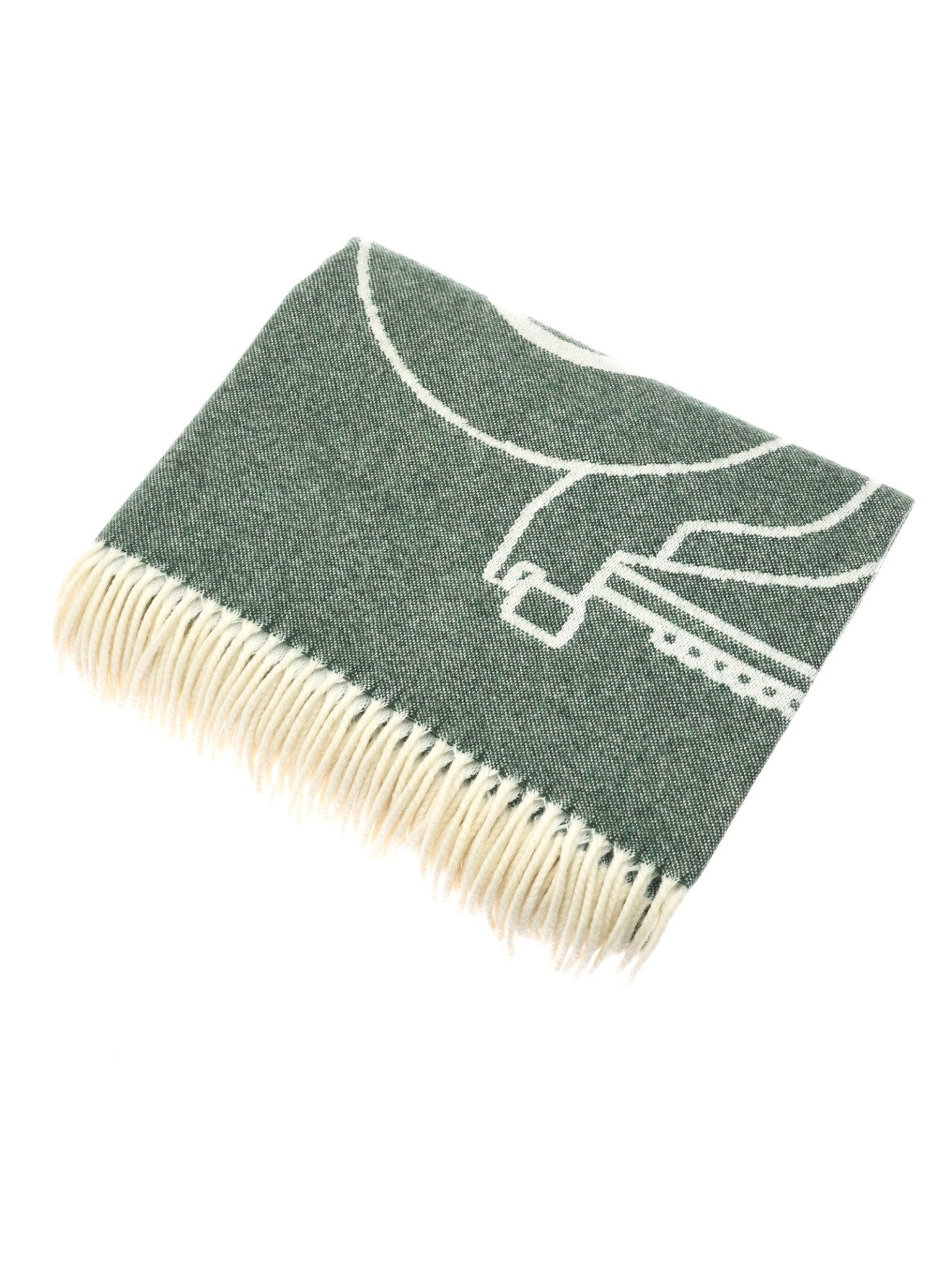 The Campbell's of Beauly Land Rover Defender Jacquard Large Scale Motif is a folded green and white British wool blanket with cream fringe, featuring a bold abstract white line design on a green background.