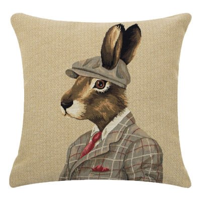 The Dapper Hare Cushion Cover by Campbells of Beauly features a charming rabbit in a plaid suit, red tie, and flat cap on a beige background—an ideal whimsical accent for your home decor.