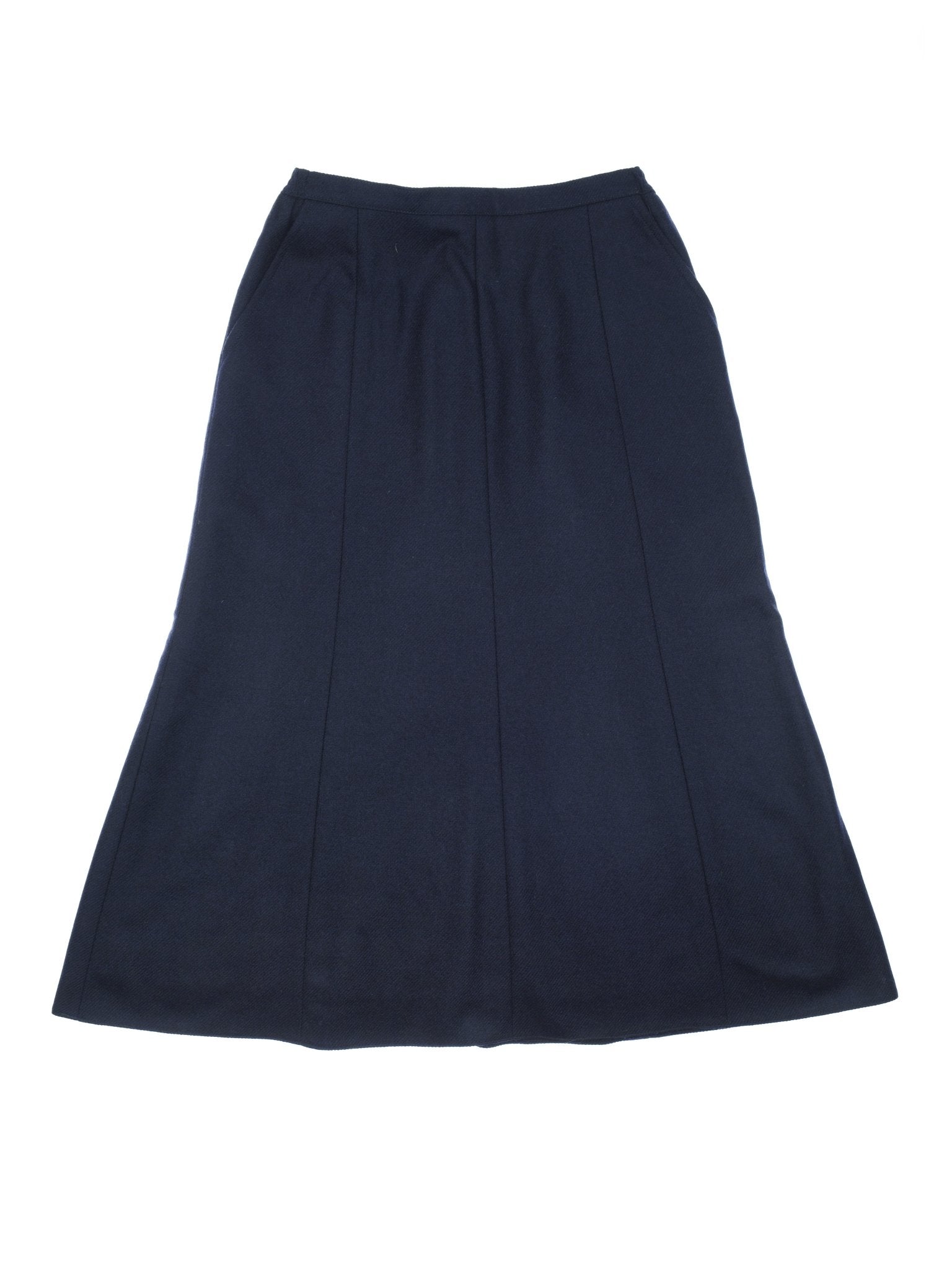 The Panel Skirt by Campbell's of Beauly is a dark navy, 8-panel A-line maxi with subtle paneling and a wide waistband—ideal to pair with a House Jacket.