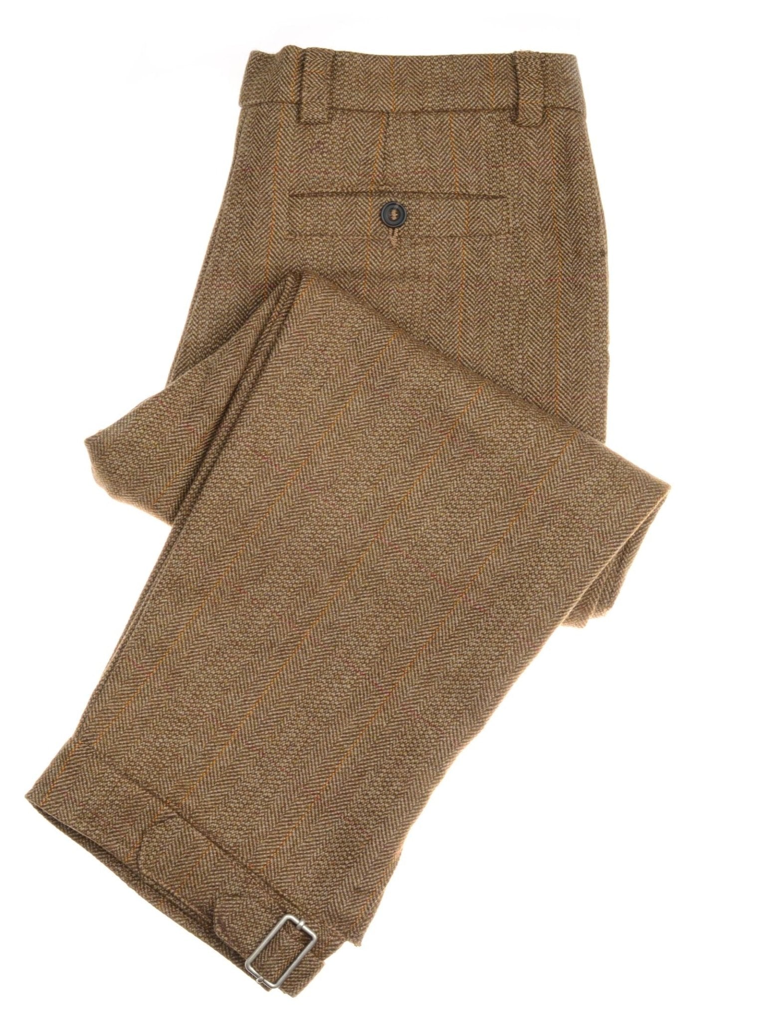 Campbell’s of Beauly Auld Stock Tweed Plus Twos feature brown herringbone tweed with orange pinstripes and ankle buckles—ideal for those who love heritage tailoring and classic sporting styles.