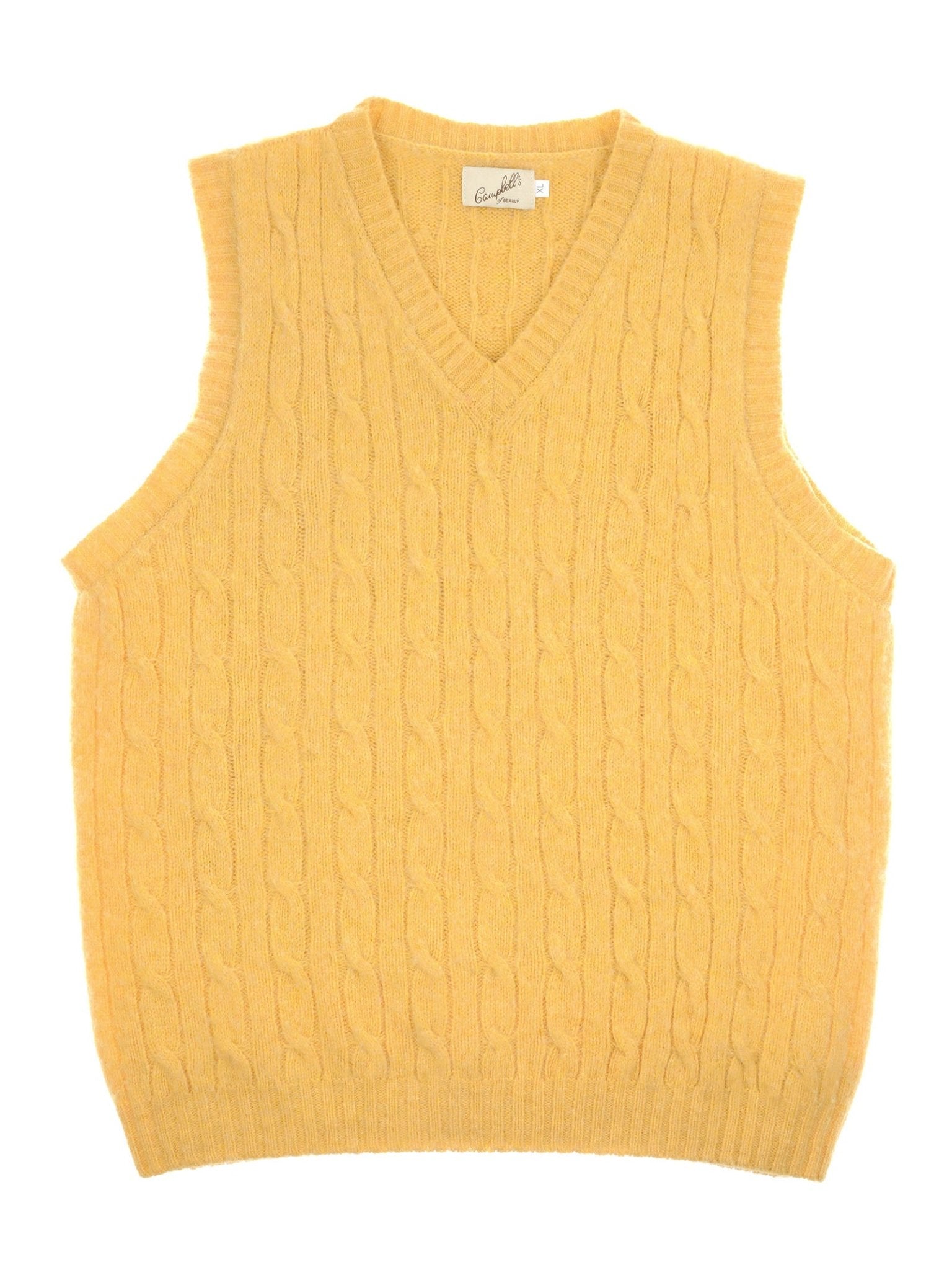 The Campbell's of Beauly Shetland Cable Slipover is a sleeveless, yellow V-neck vest crafted in Scotland from soft Shetland wool, shown laid flat on a white background.