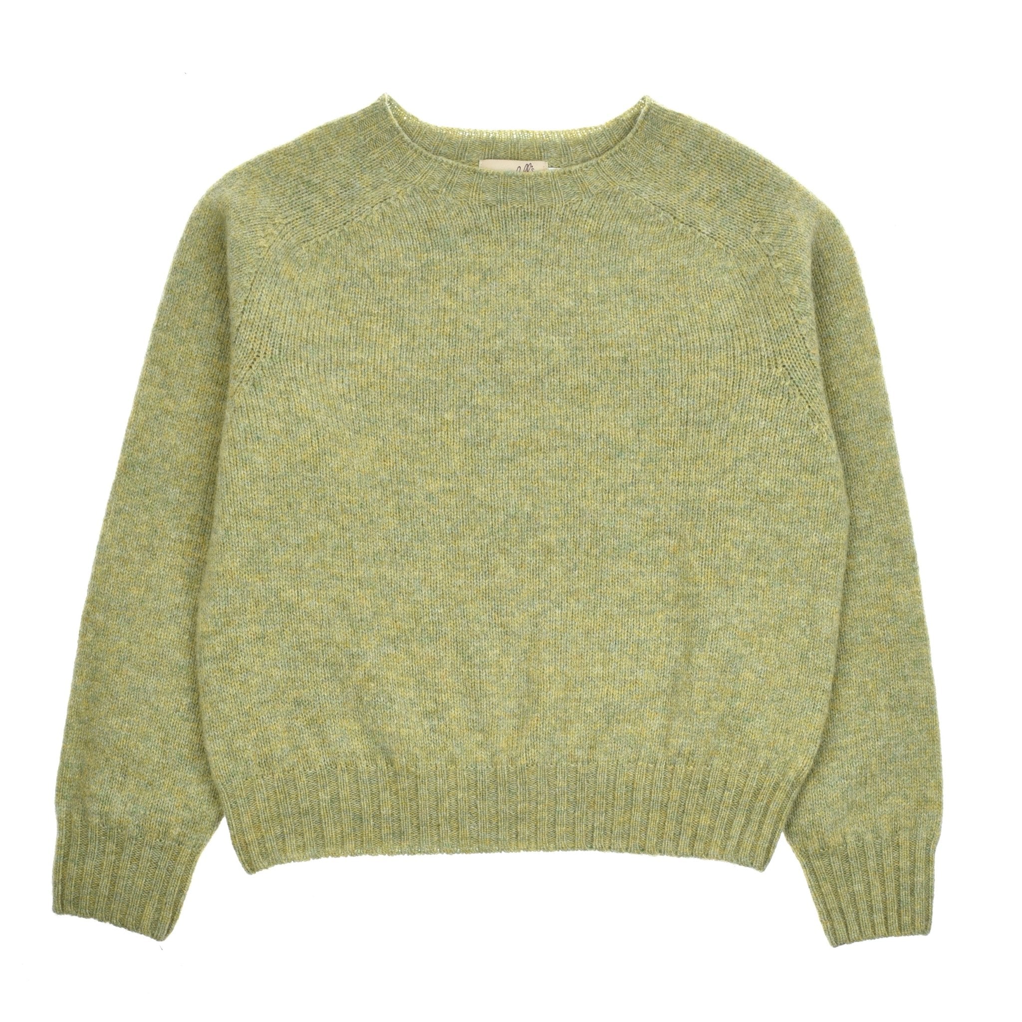 The Auld Stock Cropped Shetland Jumper by Campbell's of Beauly, in light green Shetland lambswool, features long sleeves, ribbed cuffs, and a crew neckline, shown laid flat on a white background.