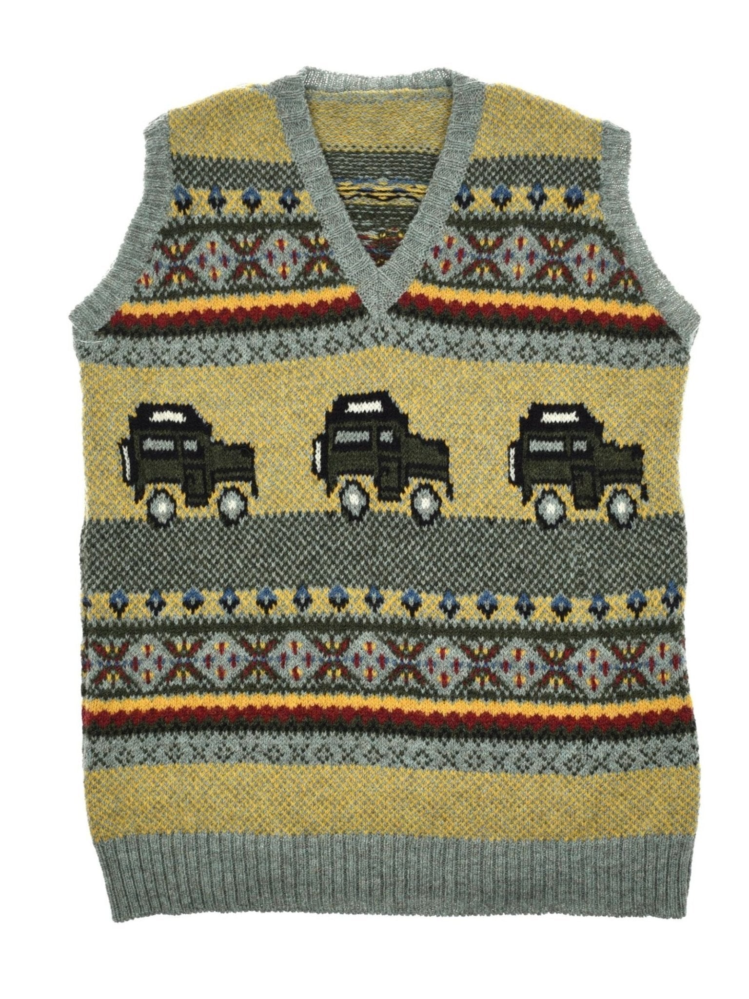 Introducing the Land Rover Defender Fairisle Slipover by Campbell’s of Beauly: a premium wool V-neck slipover, expertly knitted in yellow and gray hues, featuring colorful geometric fairisle patterns and three black car motifs inspired by the iconic Land Rover Defender.