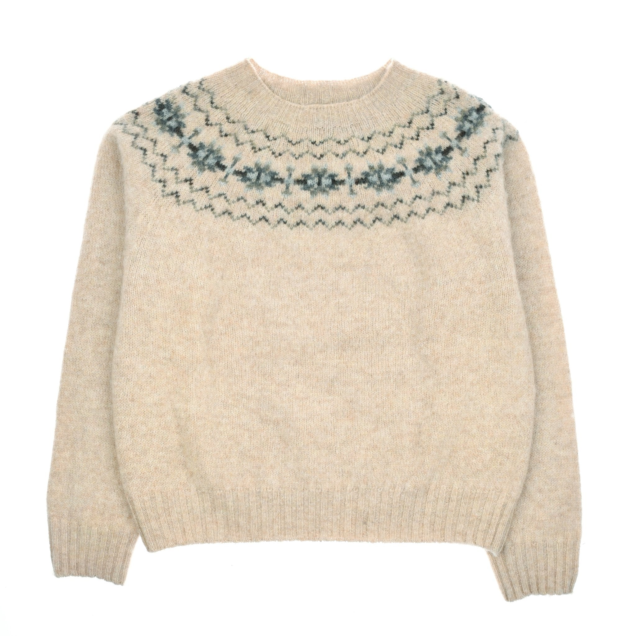 The Shaggy Cropped Fairisle Crew Jumper by Campbell's of Beauly features a beige hue, round neck, blue and grey geometric yoke pattern, and a cropped cut for a modern look.