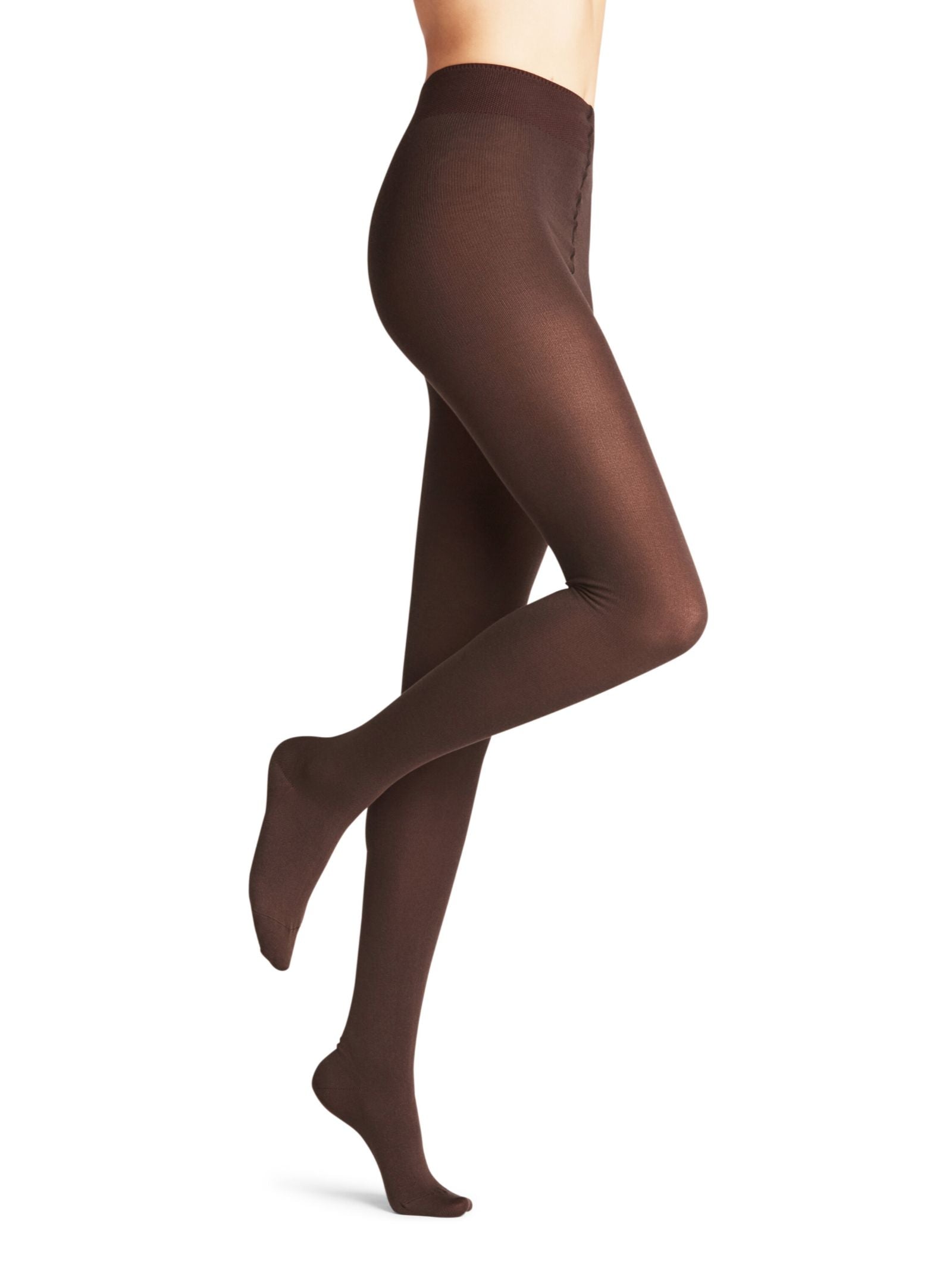 A person models FALKE Cotton Tights in opaque brown, standing on tiptoe with one leg bent, shown from the waist down against a white background.