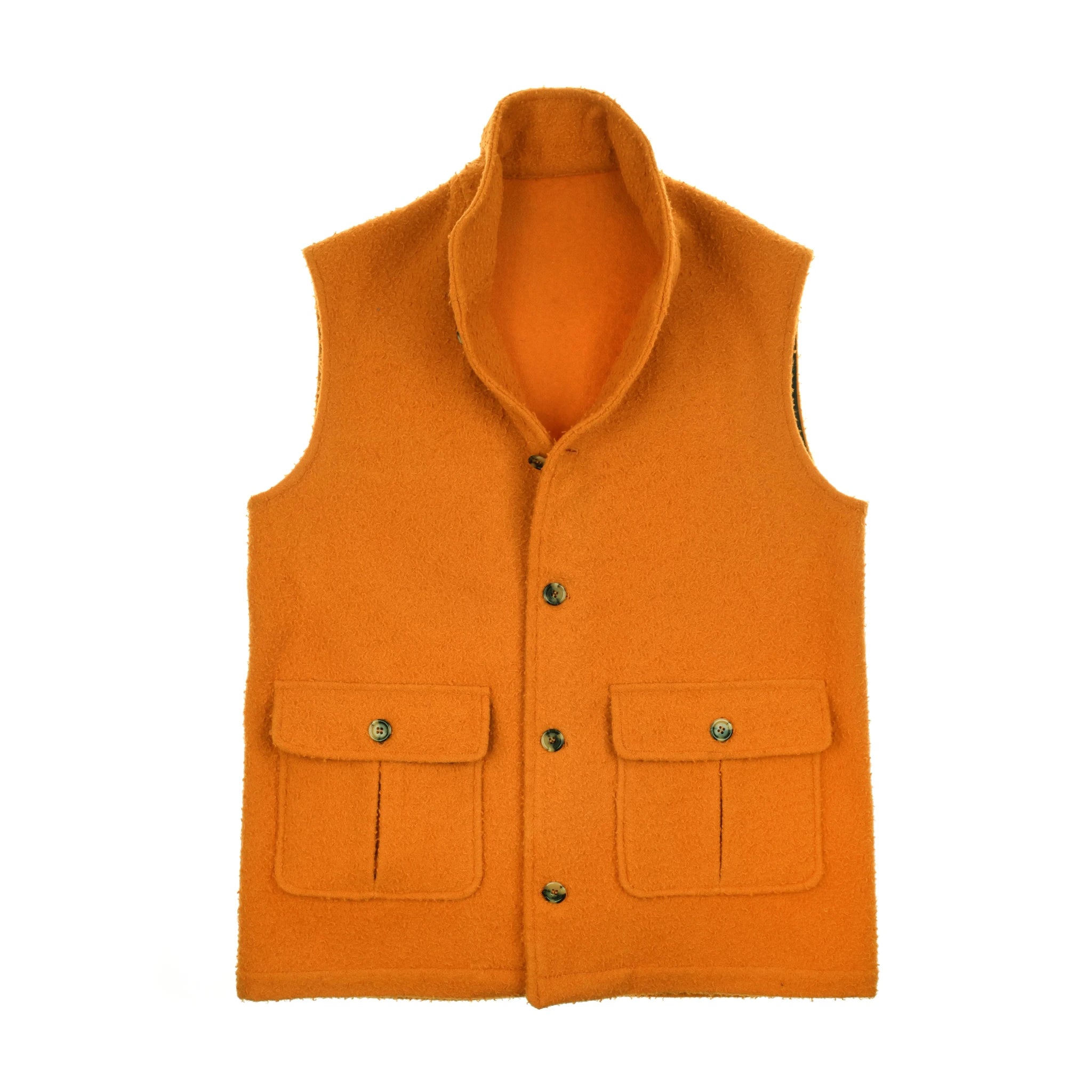 The Auld Stock Casentino Fleece Gilet by Campbell's of Beauly is an orange sleeveless vest with a high collar, button-up front, and two large flap pockets. Its heritage fabric and woolly texture echo classic Casentino wool styles.