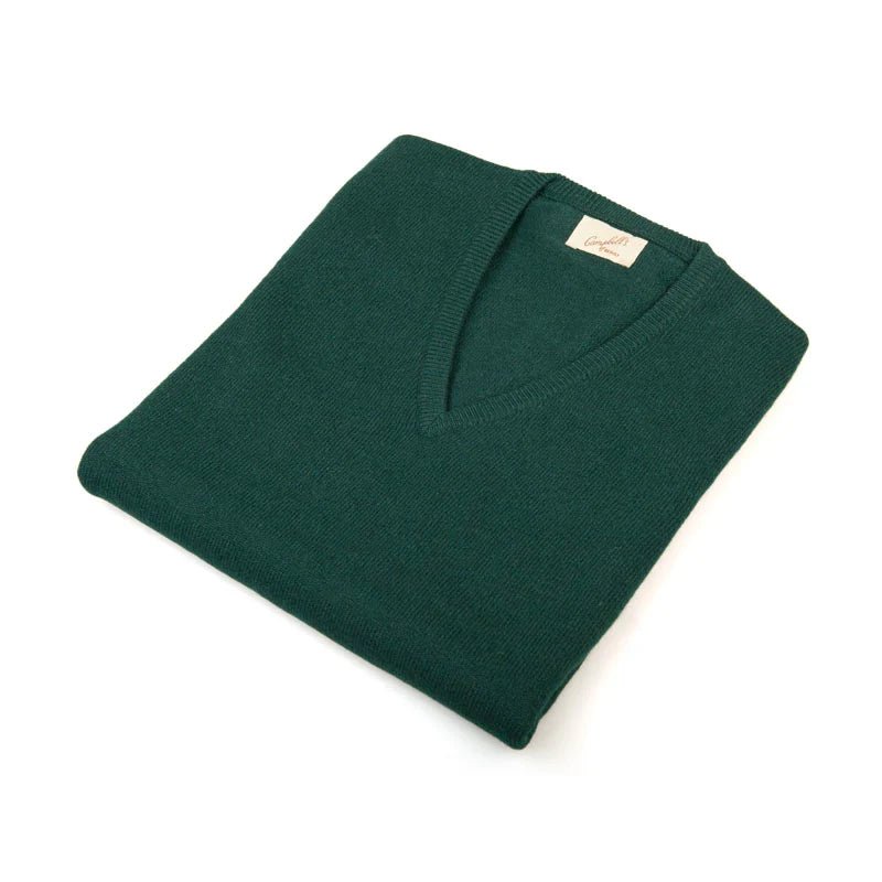 A neatly folded dark green Auld Stock Cashmere Slipover by Campbell's of Beauly, classic-fit knit with a visible beige label, displayed on a white background.