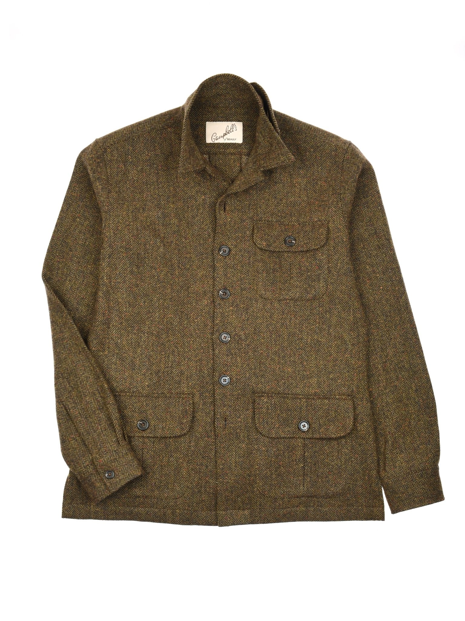 The Campbell’s of Beauly Casual Tweed Shacket is a brown British tweed wool jacket featuring a collar, button-up front, and four front pockets—three with buttoned flaps and one open chest pocket—for smart, relaxed style.