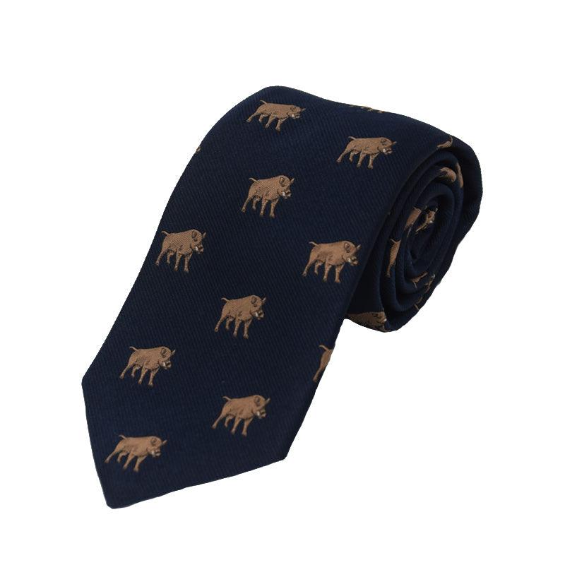 The Campbells of Beauly Boar Silk Tie in navy features a repeating boar motif and is handmade from luxurious silk. Rolled for display, this elegant accessory is shown on a white background.