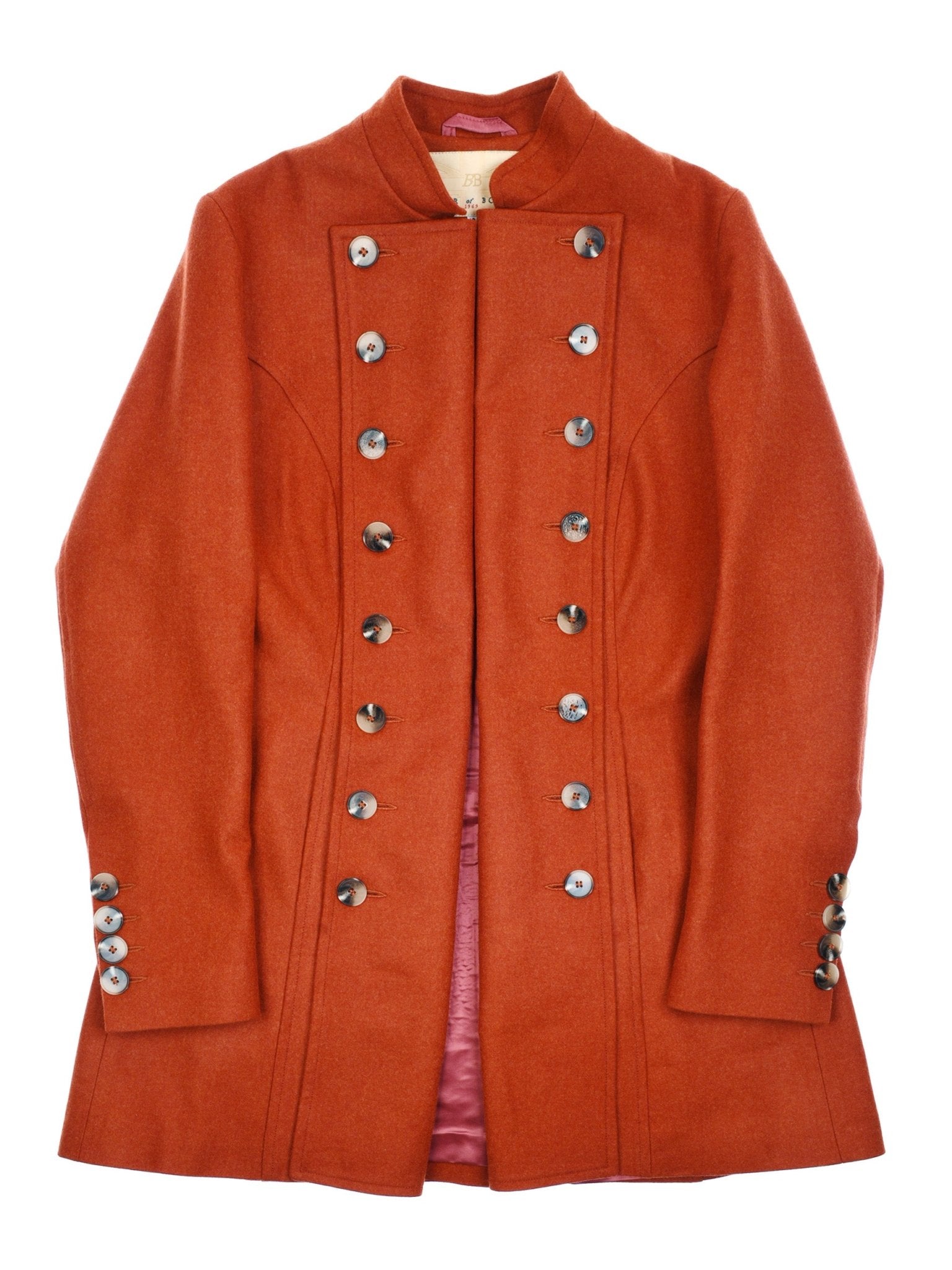 The Pirate Coat by Campbell's of Beauly is a long, tailored burnt orange coat with a high collar, double-breasted silver buttons, matching cuffs, a slight flare at the bottom, and a pink satin lining. UK crafted.