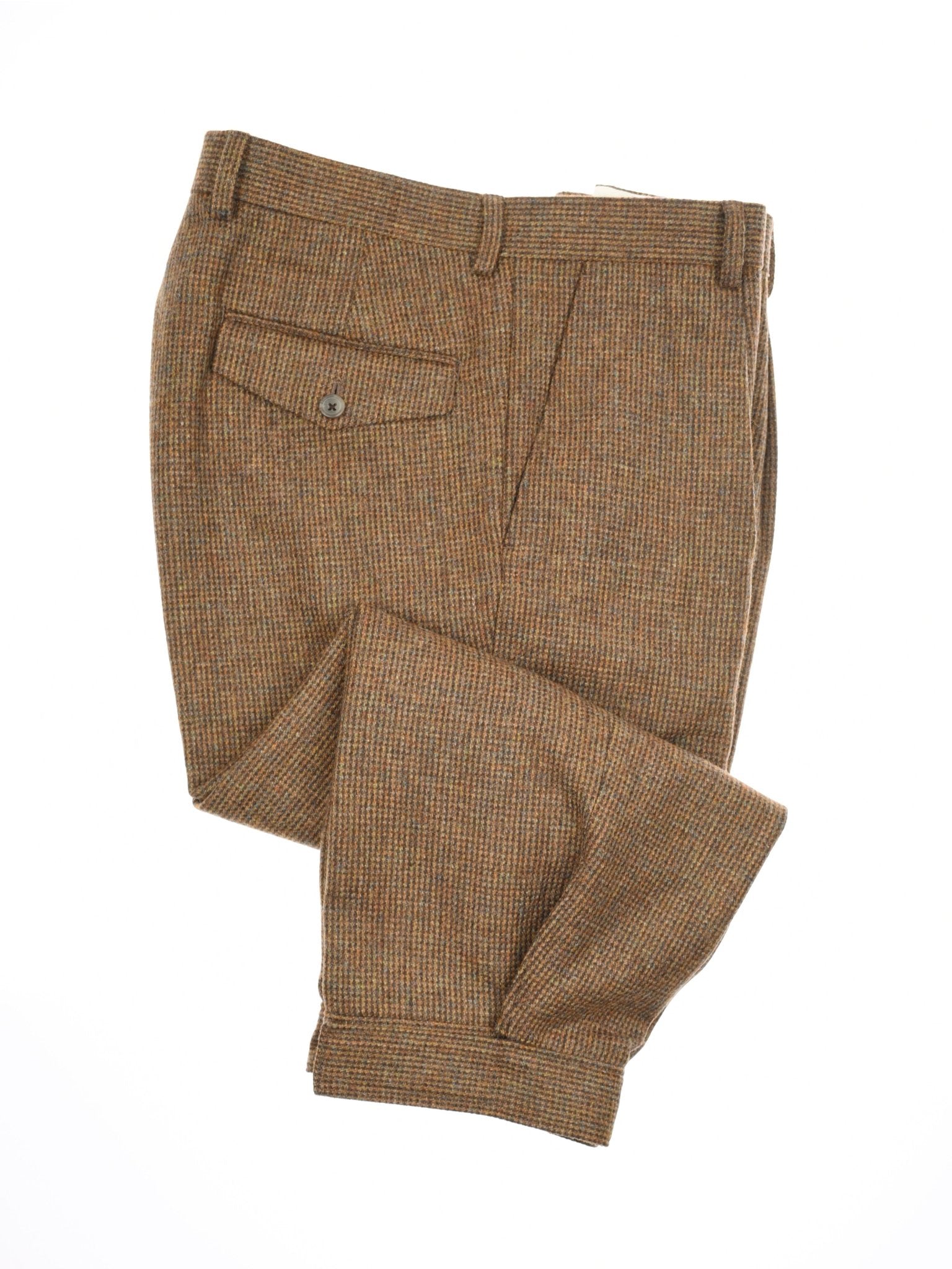Campbell's of Beauly Tweed Breeks: brown plaid wool trousers in classic country style, with a buttoned back pocket, belt loop waistband, and cuffed hems. Shown laid flat with one leg folded, reminiscent of traditional breeks.