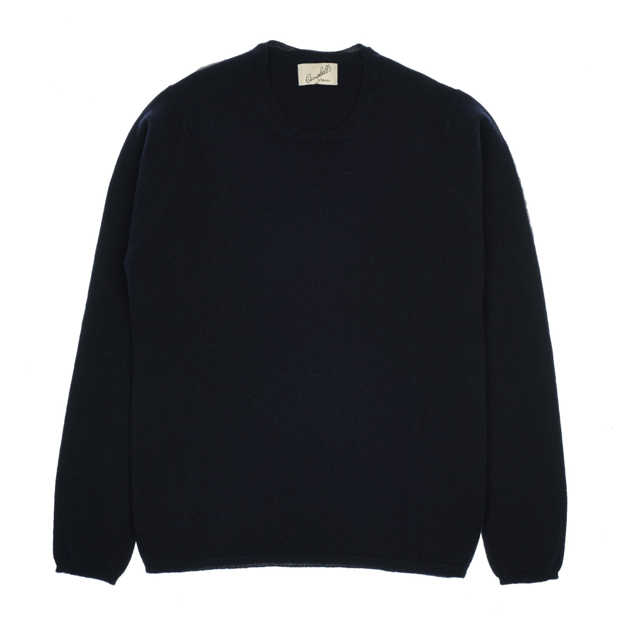 The Campbells of Beauly Cashmere Crew Neck in navy is a soft, slightly textured jumper with long sleeves. Laid flat on a white background, it features a small neck label and reflects the timeless style of the Scottish Borders.