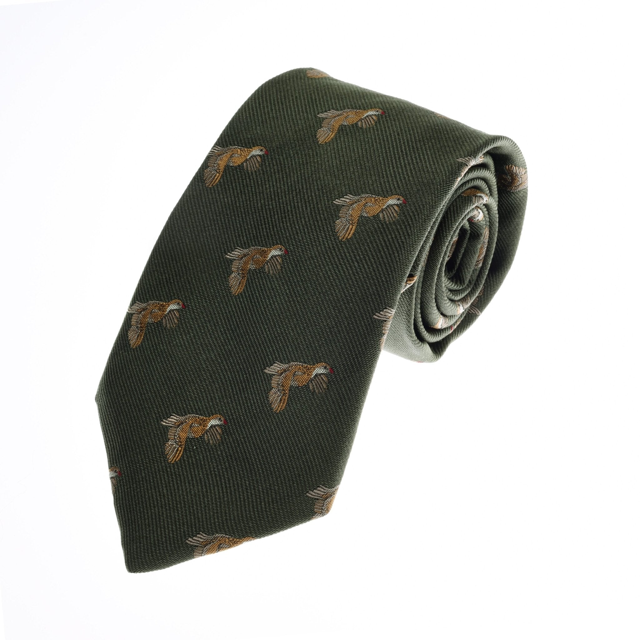 The Partridge Silk Tie by Campbells of Beauly is a handmade olive green necktie, featuring a classic flying partridge motif with brown wings and red accents, crafted from premium silk and shown on a white background.