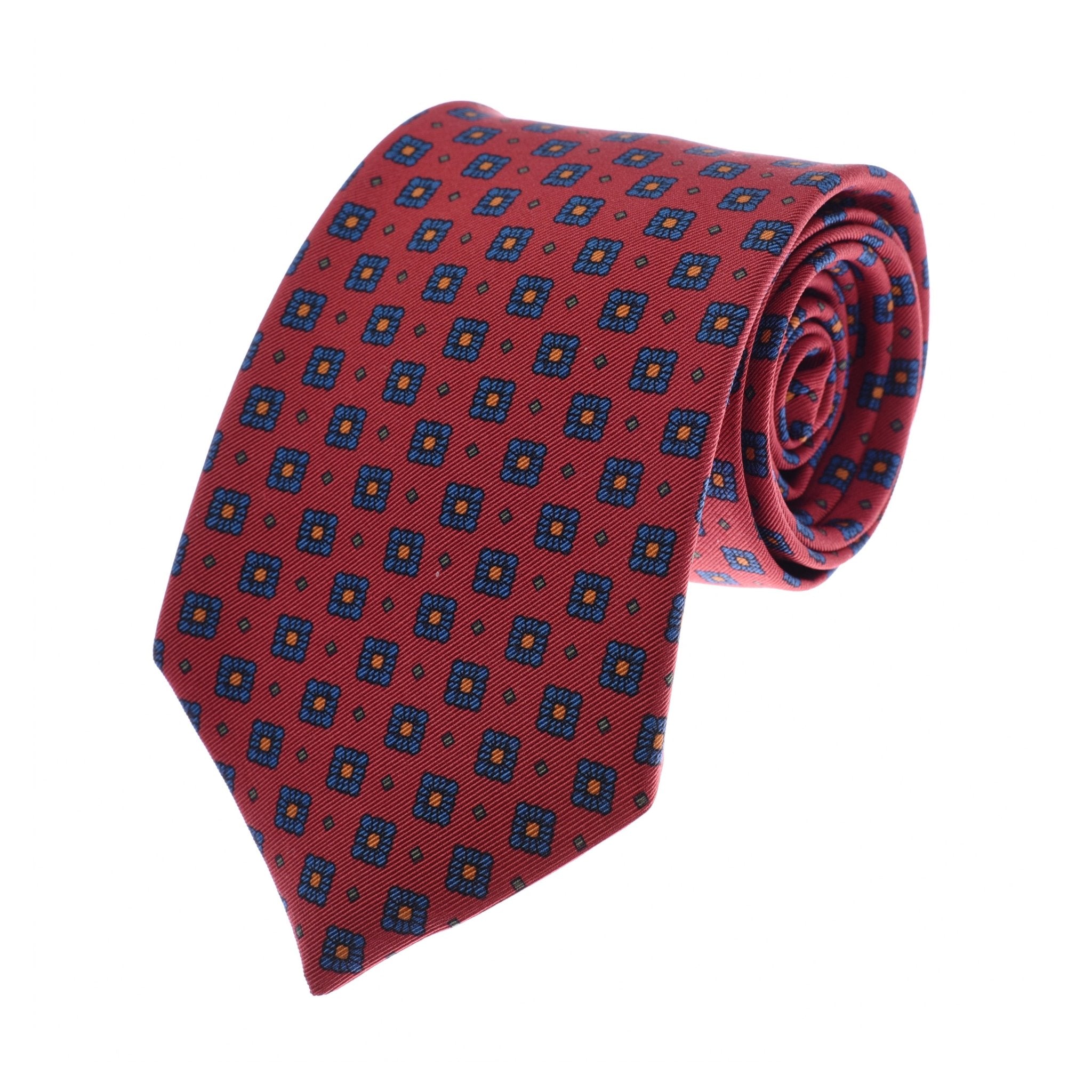 The Campbells of Beauly Paisley Silk Tie in navy, handmade from the finest silk, features a classic paisley pattern and is displayed on a white background.