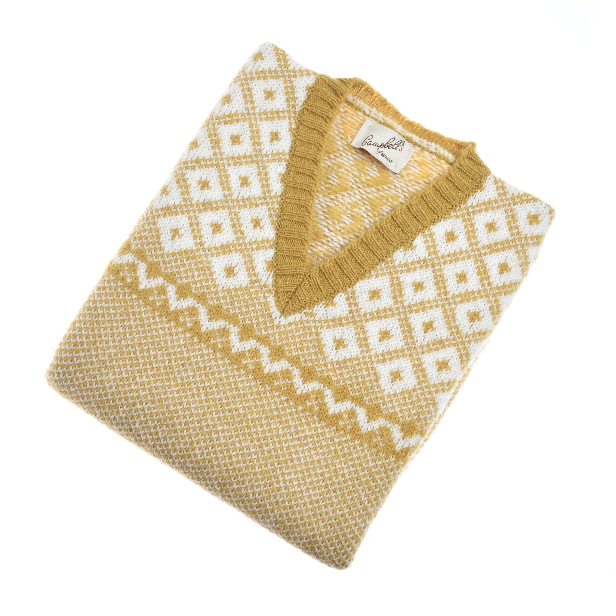 The Auld Stock Nordic V Tank by Campbell's of Beauly is a folded yellow and white Shetland wool slipover with a geometric diamond pattern, shown on a white background.