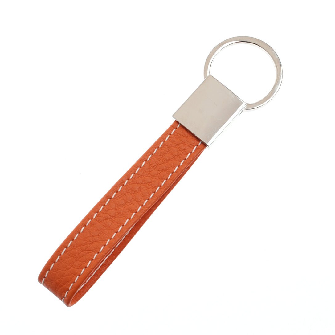 The Campbell's of Beauly Leather Loop Keyring features an orange leather strap with white stitching and a silver metal ring and connector, making it a stylish key organiser. Shown on a white background.