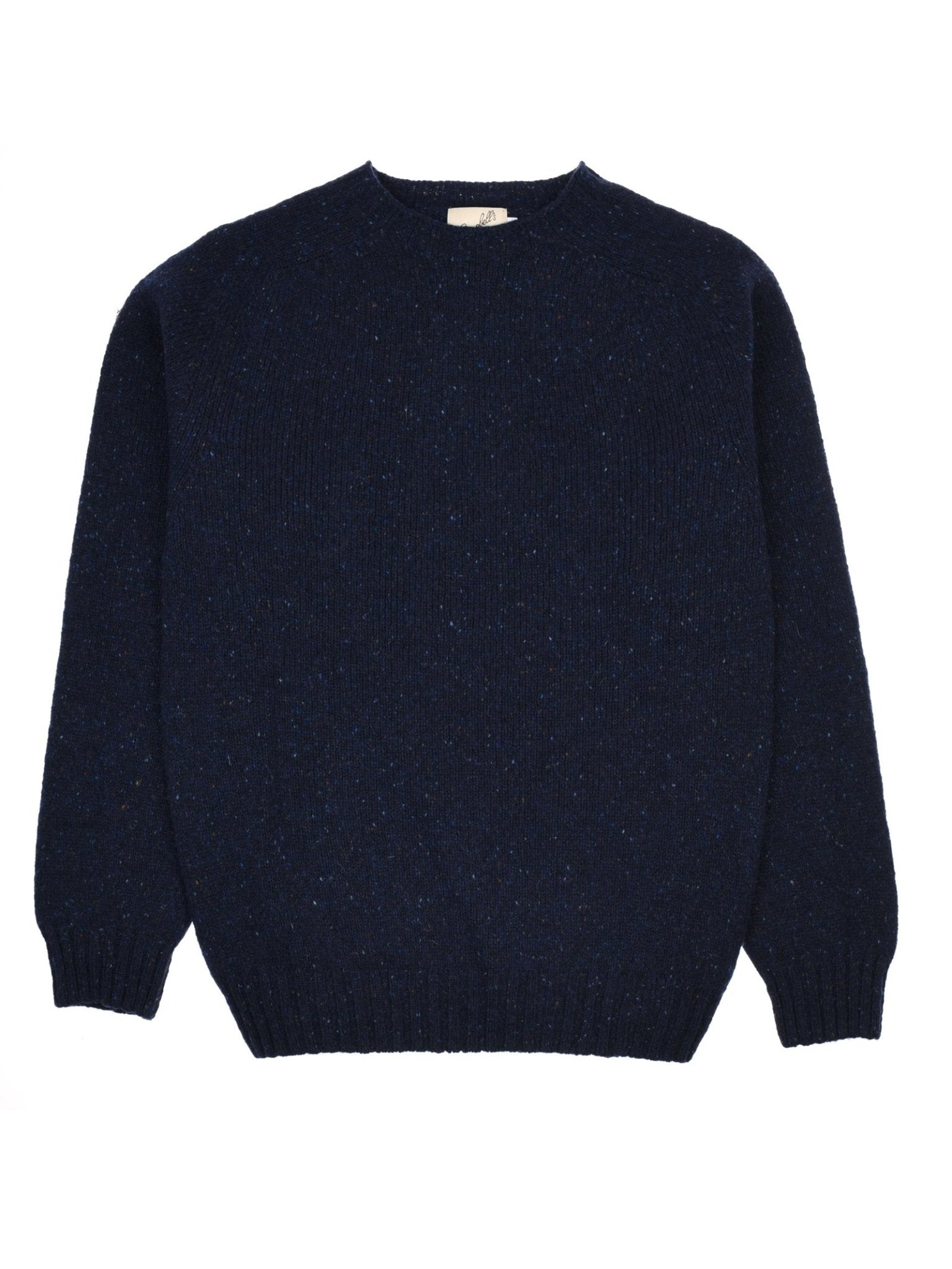 A navy blue, long-sleeve Donegal Lambswool Crew Neck Jumper by Campbell’s of Beauly is laid flat on a white background. Made in Scotland from soft lambswool, the jumper features a ribbed hem, cuffs, and neckline, with a slightly textured knit pattern.