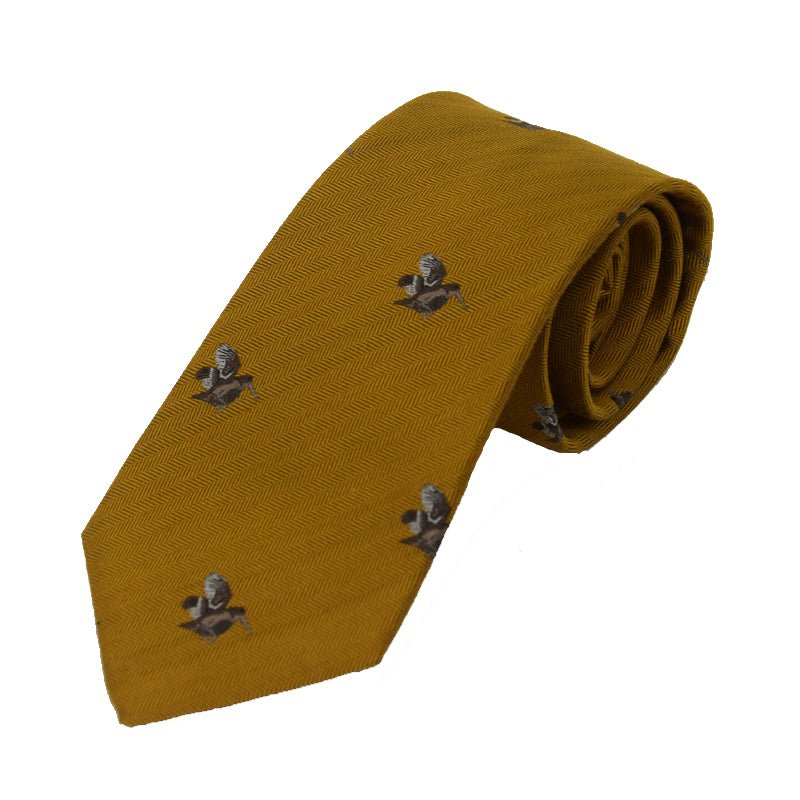 The Woodcock Silk Tie by Campbell's of Beauly features a mustard yellow silk with a subtle herringbone pattern and repeating dark grey countryside duck motifs.