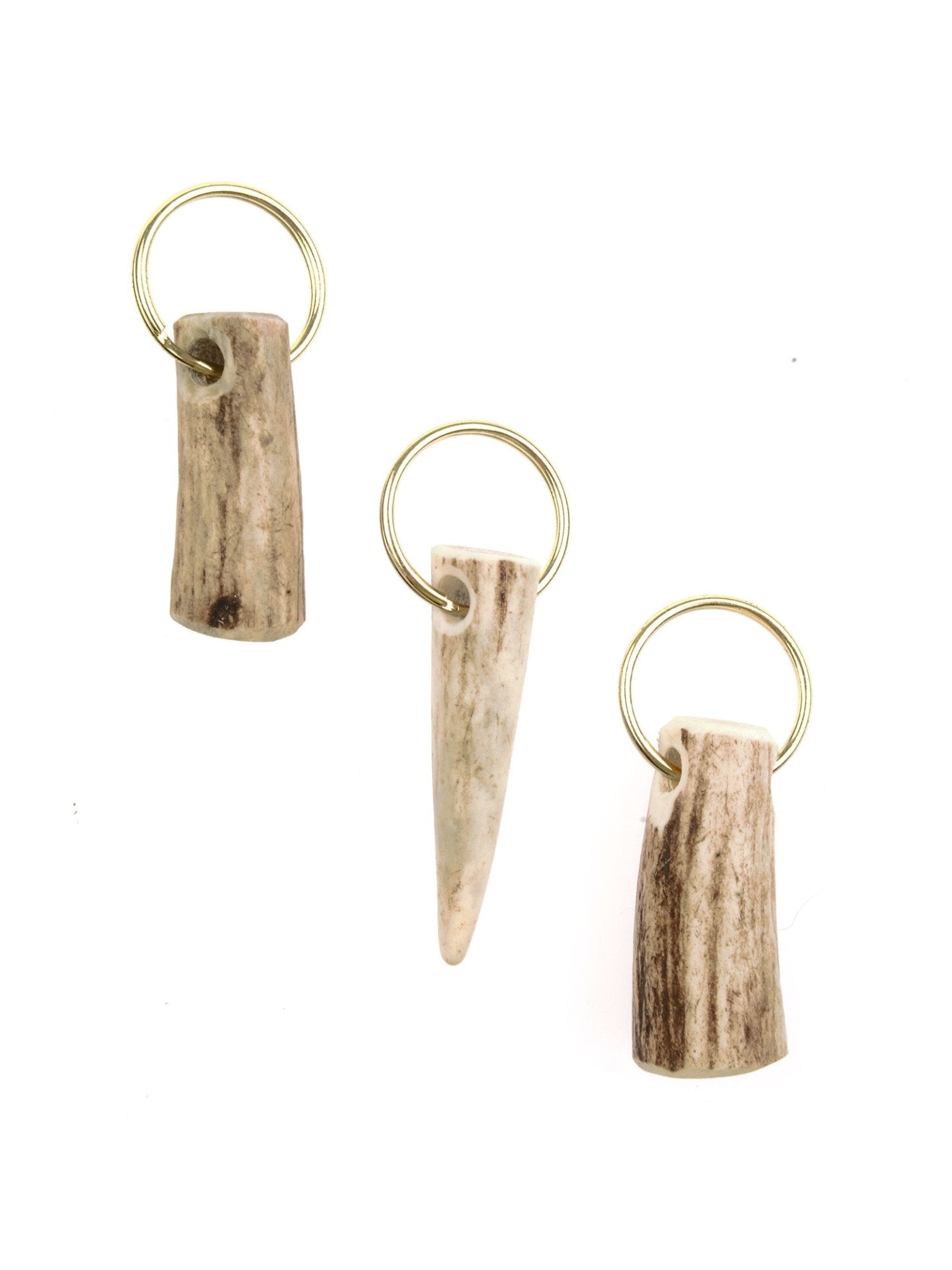 Campbell's of Beauly Antler Keyring set includes three handmade keychains with gold rings, each featuring a unique polished antler or bone shape—ideal as distinctive gifts or personal accessories, shown on a white background.