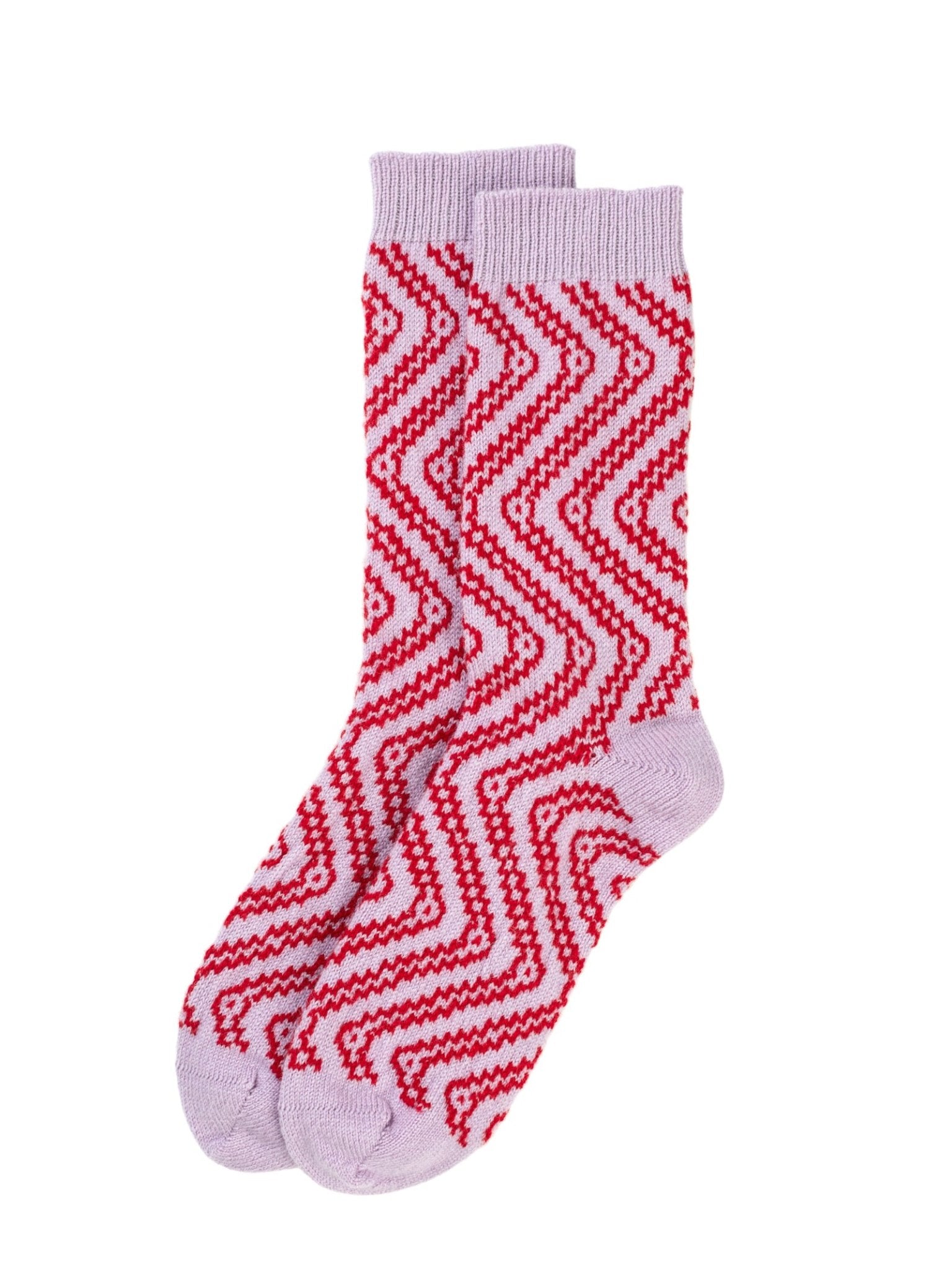 A pair of Campbell’s of Beauly Cashmere Swirly Socks in lavender, featuring bold red zigzag patterns, displayed side by side on a white background.