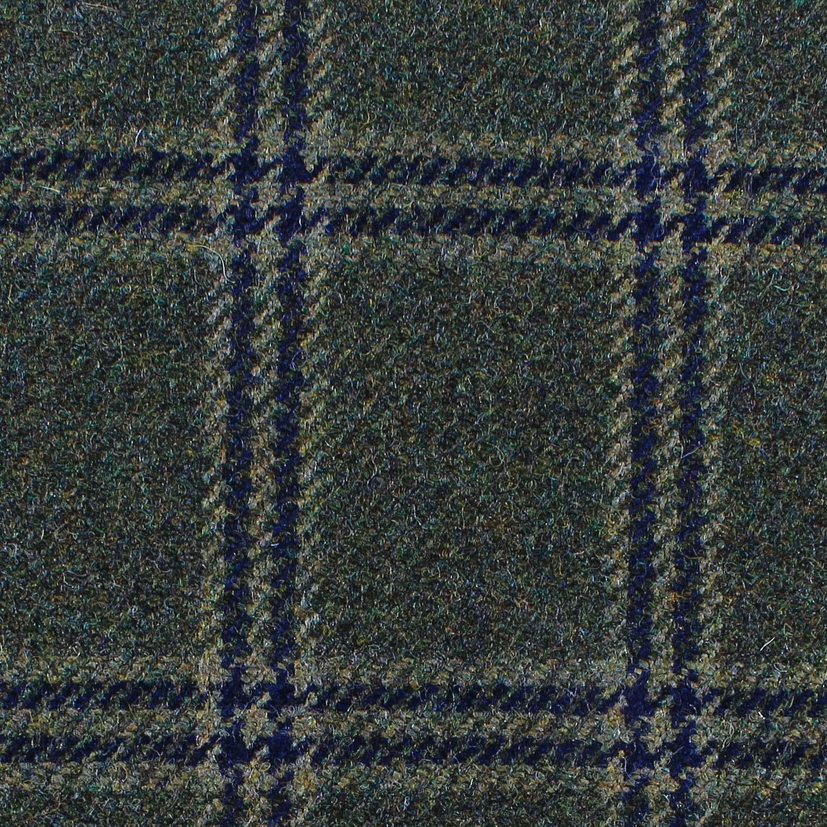 Estate Tweed 004 in dark green estate weight tweed featuring a blue and olive windowpane plaid pattern.