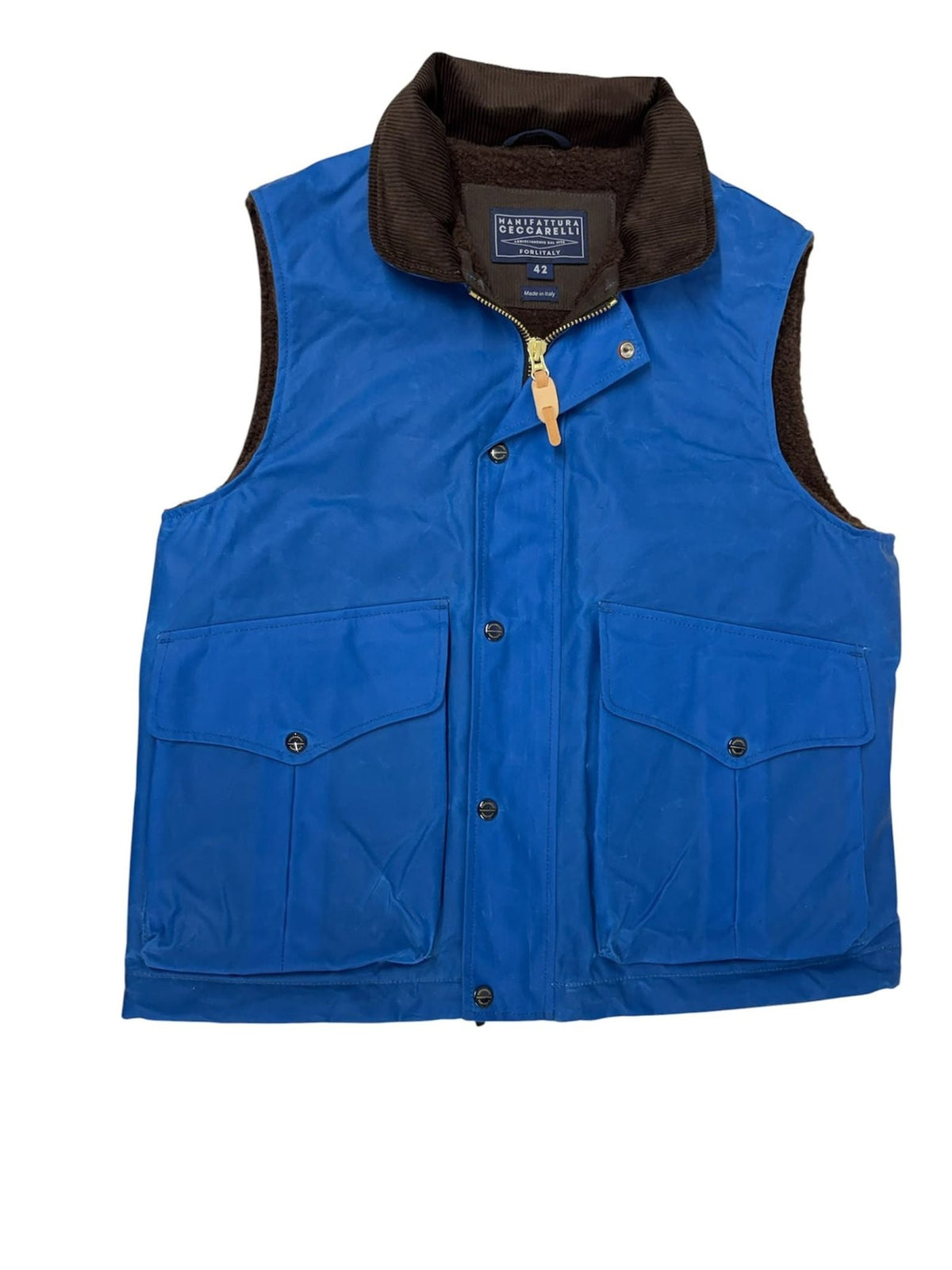 Mid blue Wax Nehru Gilet by Campbell’s of Beauly, featuring a sleeveless waxed cotton design with front snap buttons, two large front flap pockets, and a brown corduroy collar, displayed flat on a white background—an essential country gilet that embodies refined Italian craftsmanship.