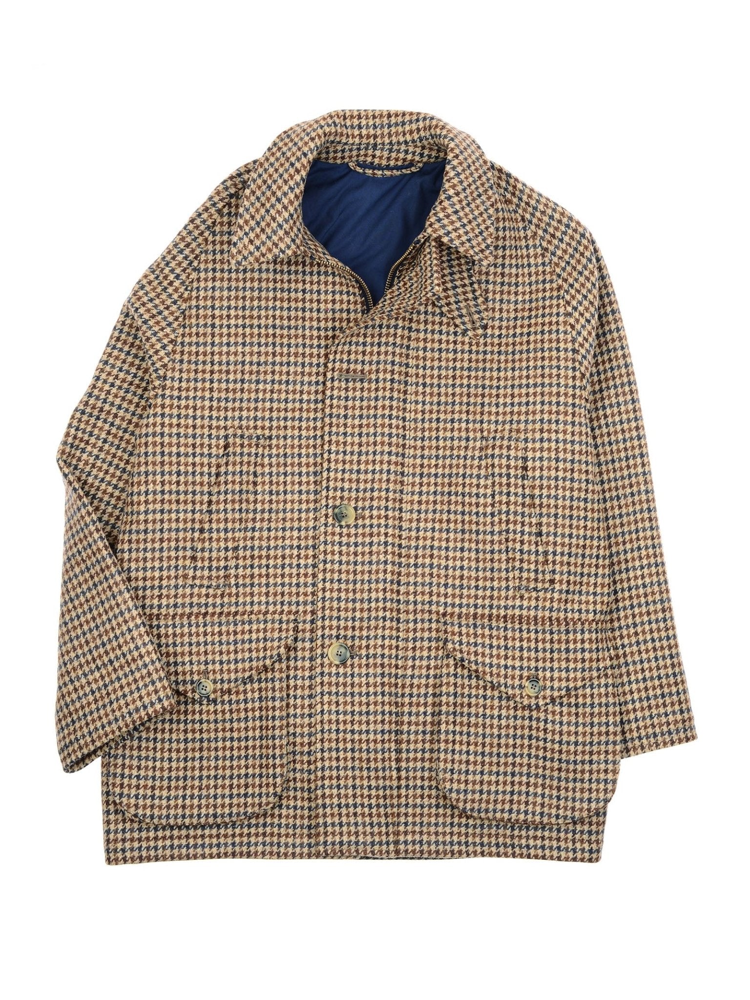 The Cannich Coat by Campbell's of Beauly is a brown and beige houndstooth field coat with a collar, front buttons, two large pockets, and dark blue lining—ideal for classic country style.