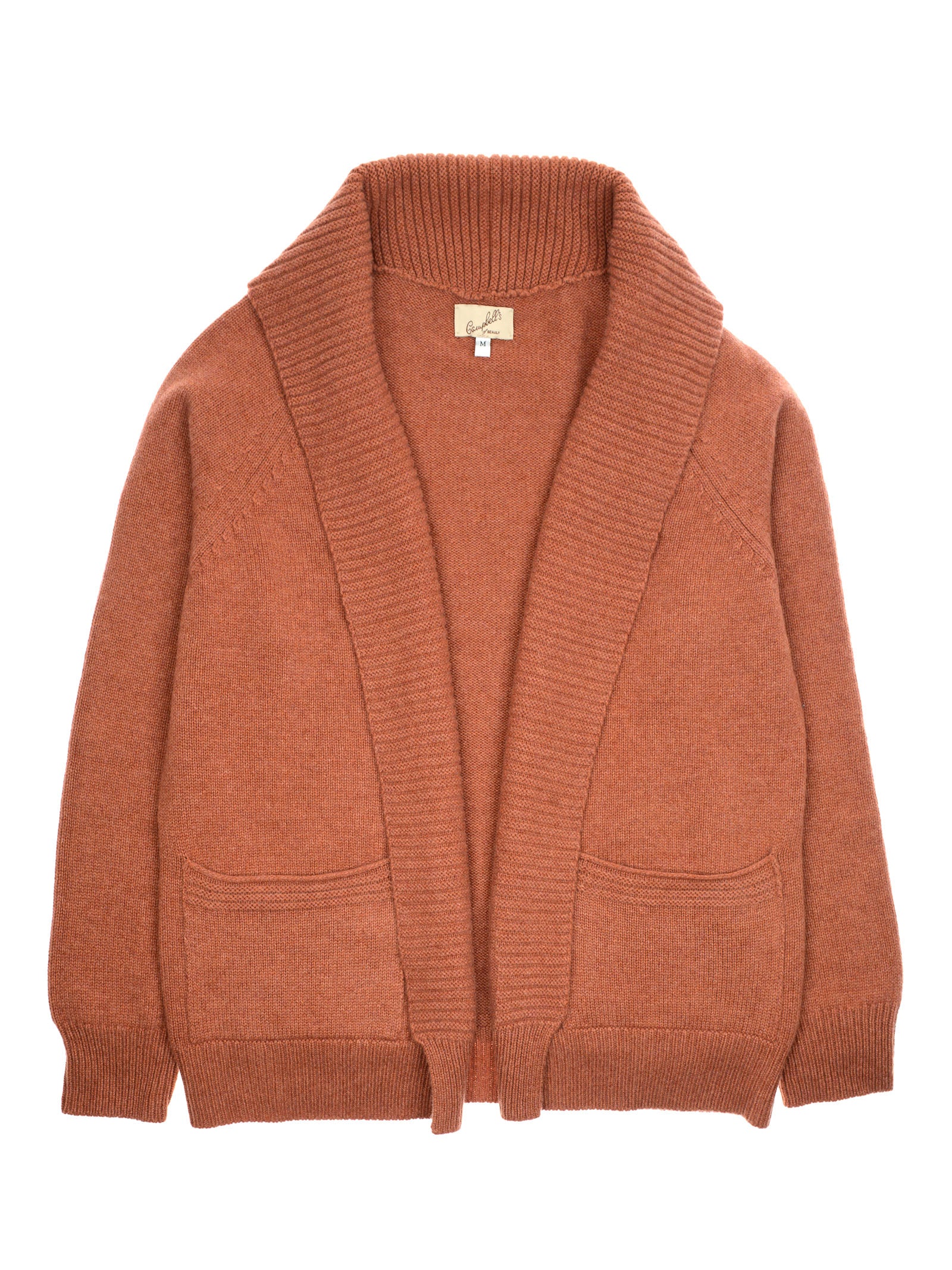 A rust-colored Cashmere Shawl Cardigan by Campbell’s of Beauly, featuring an open front, long sleeves, ribbed collar and edges, and two front pockets, is laid flat on a white background.