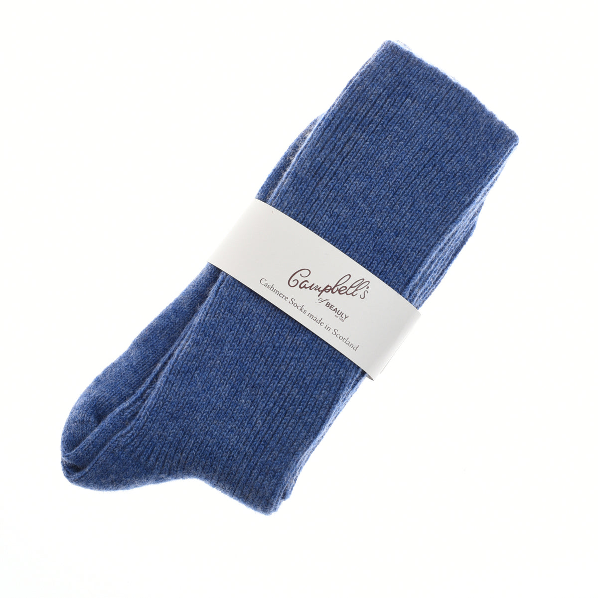 A pair of cornflower blue Plain Cashmere Socks by Campbells of Beauly, folded and wrapped in a white label, displayed on a plain white background—an ideal luxury gift from the Scottish Borders.