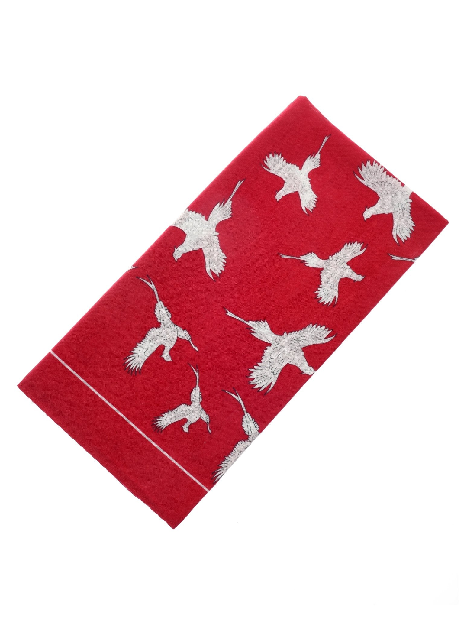 The Cotton Pheasant Hank by Campbell's of Beauly—crafted in red cotton and featuring a white pheasant pattern—is neatly folded on a white background, making it a charming country accessory.