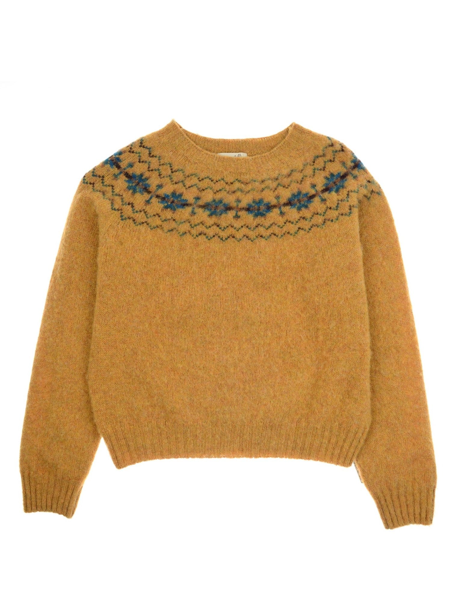 The Shaggy Cropped Fairisle Crew Jumper by Campbell's of Beauly is a butterscotch Pure New Wool sweater with long sleeves, a round neckline, and a blue and dark green geometric yoke in classic Fairisle style.