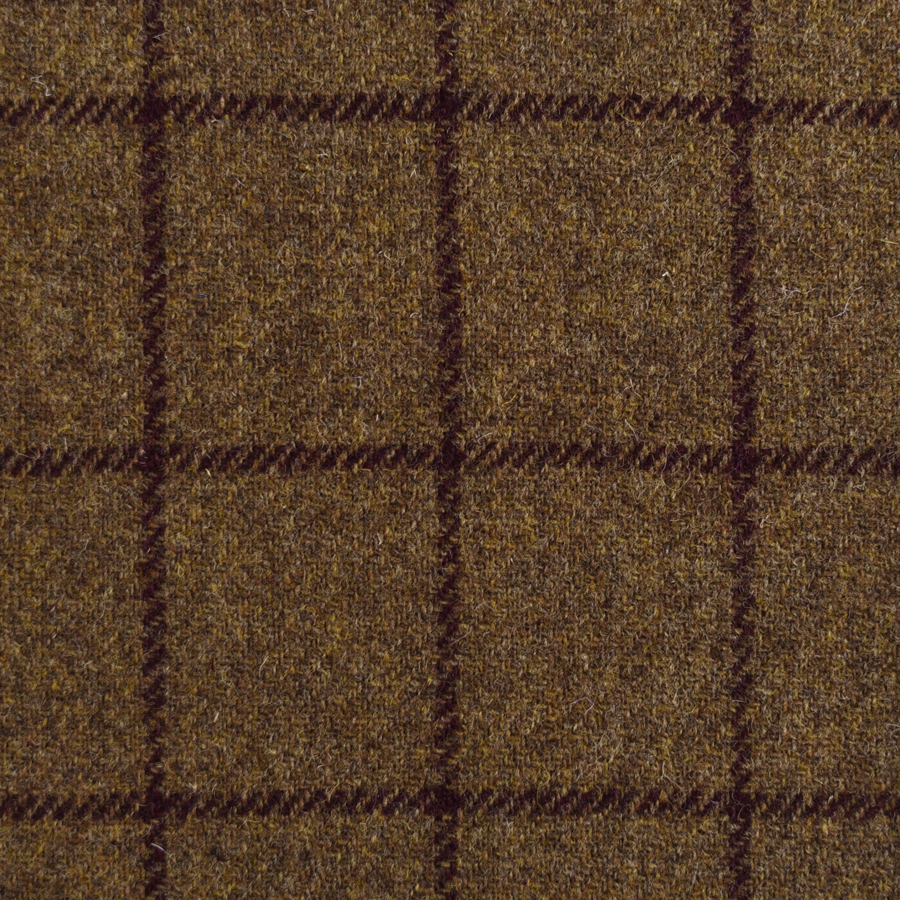 A close-up of Harris Tweed 79367 by Campbell's of Beauly shows brown wool with a dark brown windowpane check. Evenly spaced lines create squares, and the textured fabric reflects robust Scottish tailoring tradition.