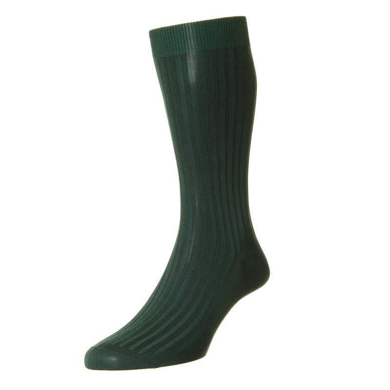 A single dark green ribbed Campbell’s of Beauly Cotton Sock stands upright on a white background, offering everyday comfort with breathable cotton.