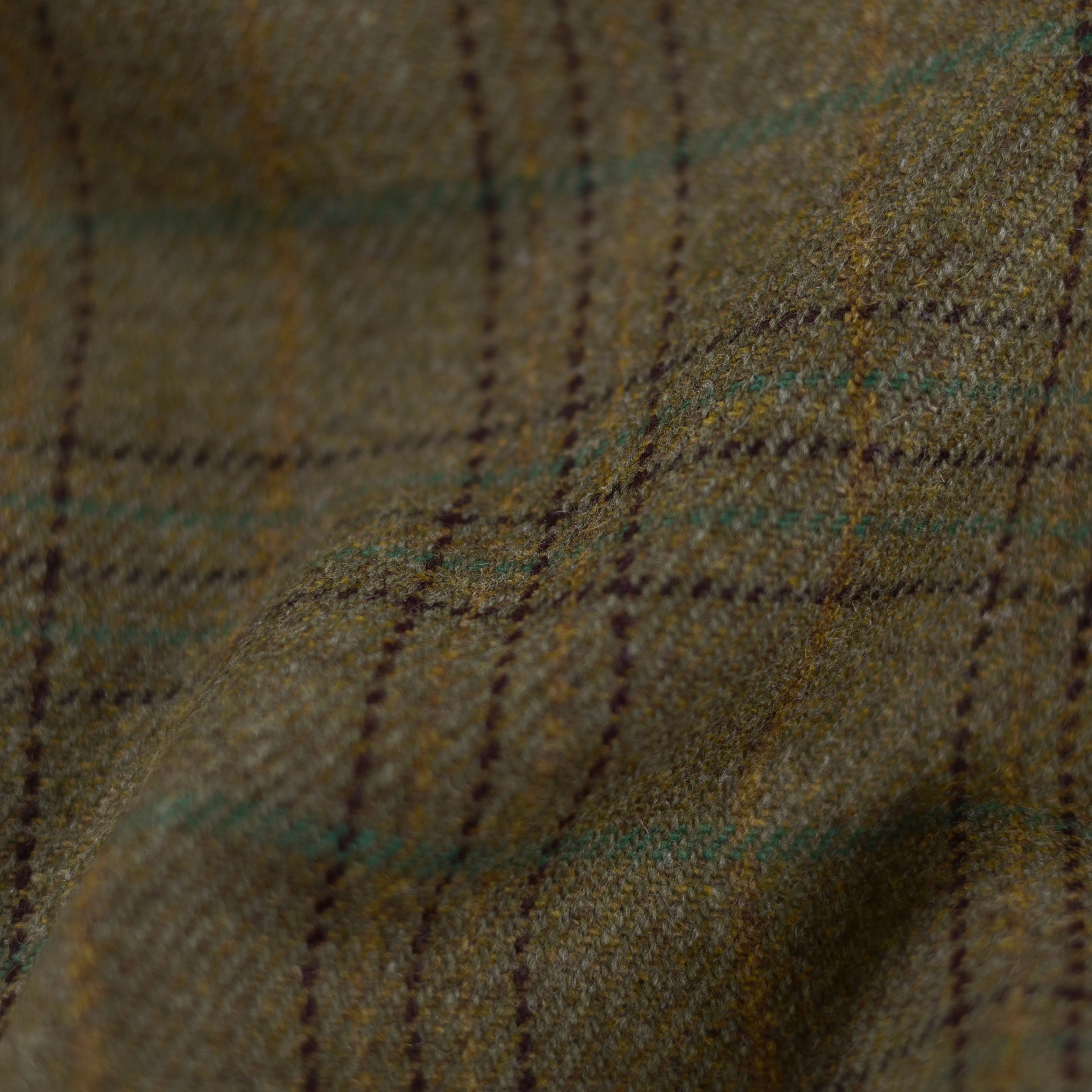 A close-up of House Tweed 30249 by Campbell's of Beauly, highlighting the rich texture and heritage craftsmanship of Scottish tweed.