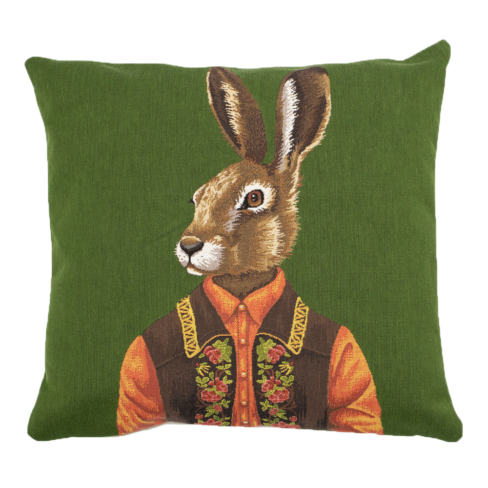 The Alpine Hare Cushion Cover by Campbell’s of Beauly features a green design with a realistic alpine hare, human body, and embroidered orange floral shirt—an eye-catching piece for unique home decor.