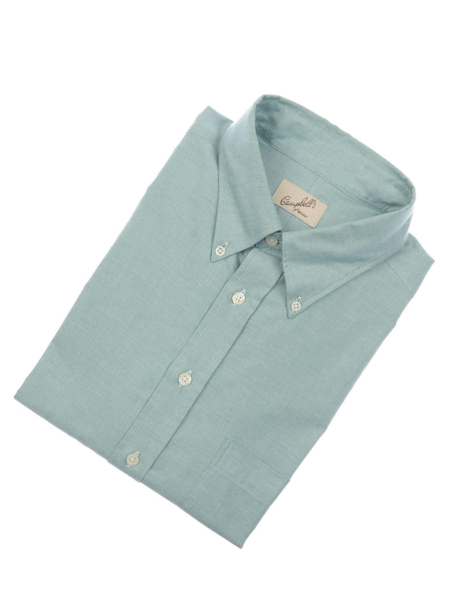 The Campbell's of Beauly Oxford Button Down Shirt is a neatly folded light blue cotton shirt with a front pocket, white buttons, and an inner brand tag—ideal for anyone seeking a classic summer look.