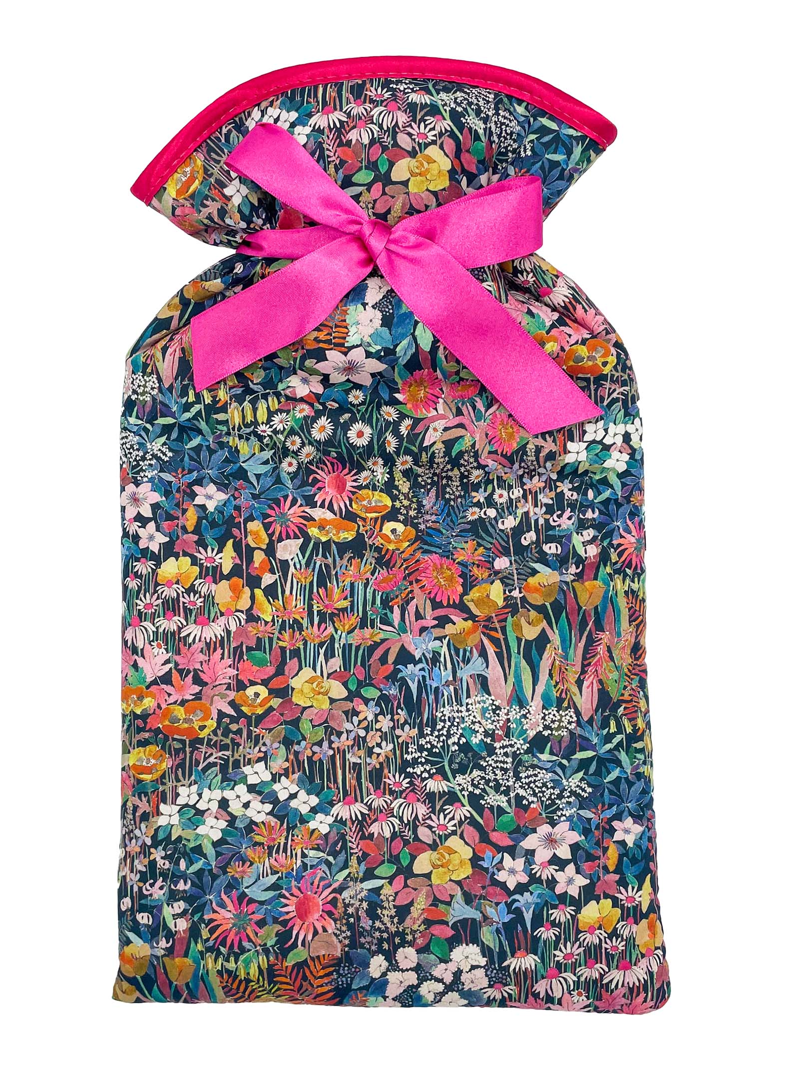 An Alice Caroline fabric bag made from Liberty cotton with a vibrant floral design and a pink ribbon—ideal for gifting or storing your Liberty Print Hot Water Bottle in style.