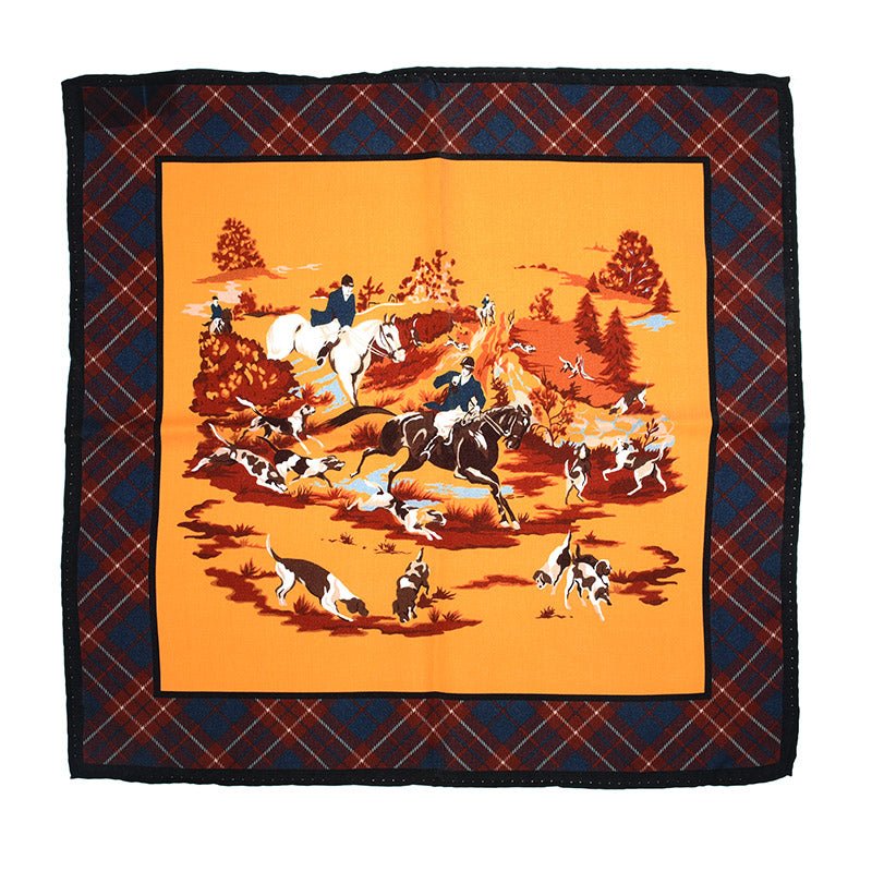The Horse & Hound Gold Hank by Campbell's of Beauly is a heritage silk handkerchief with an orange center depicting horse riders and hounds, bordered by red and blue plaid—an ideal gift for horse enthusiasts.